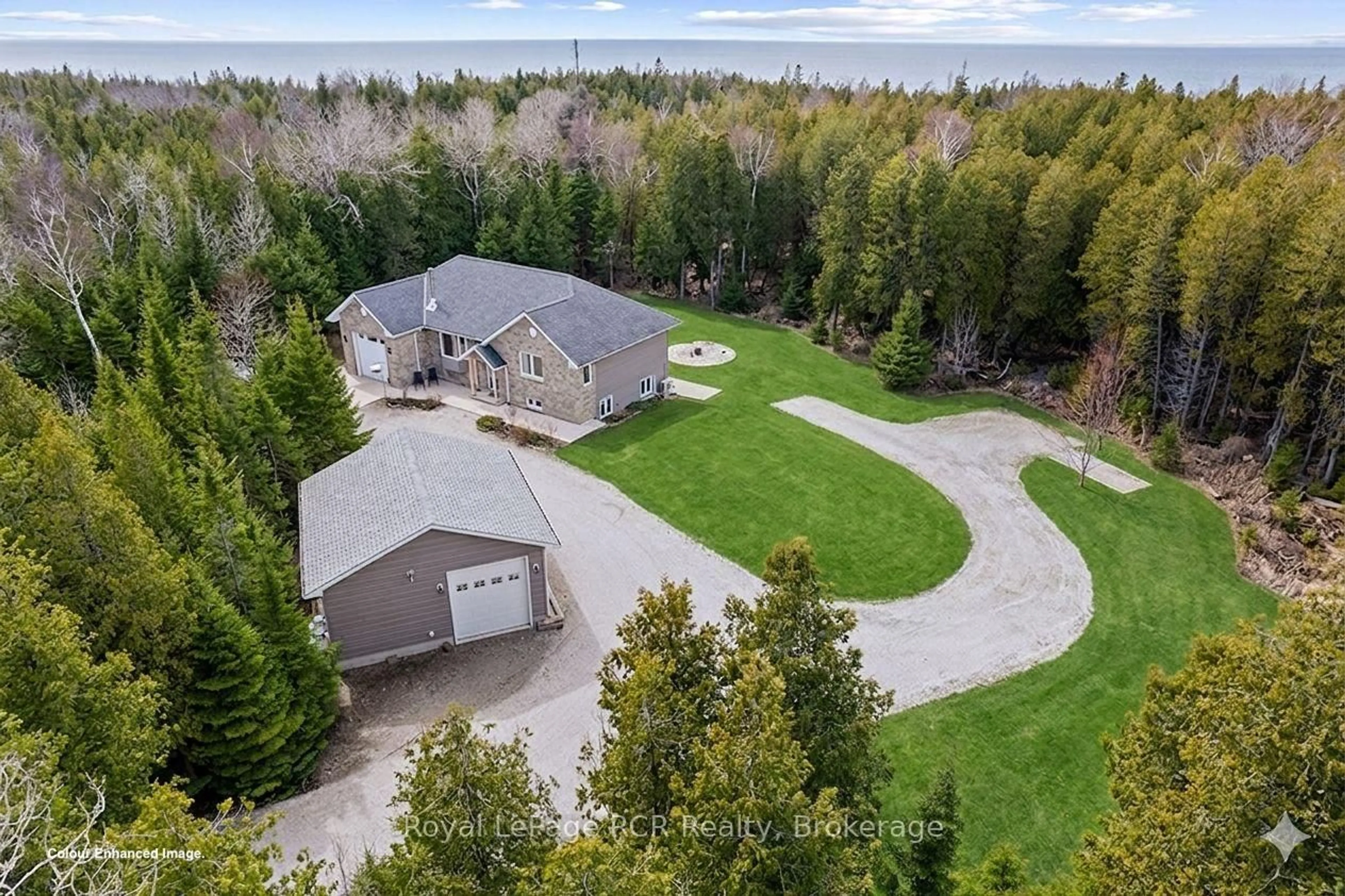 A pic from outside/outdoor area/front of a property/back of a property/a pic from drone, forest/trees view for 109 Pike St, Northern Bruce Peninsula Ontario N0H 1W0
