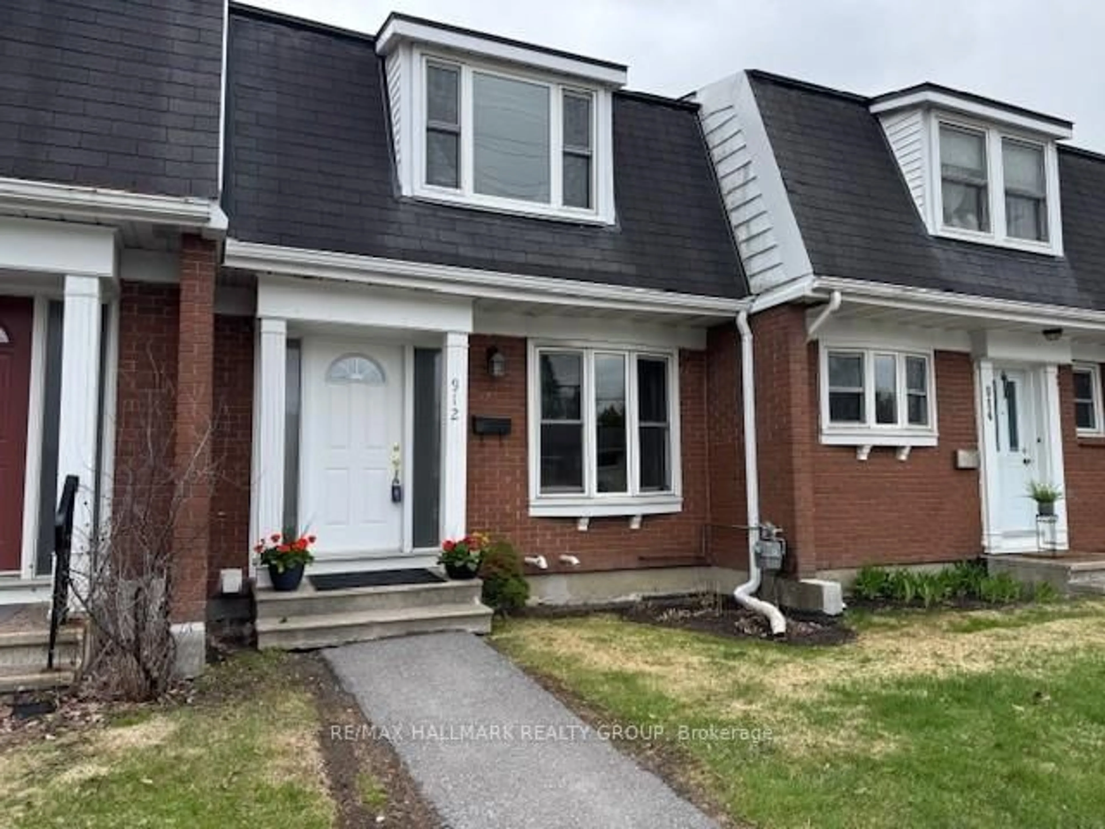 Home with brick exterior material, street for 912 Dynes Rd, Ottawa Ontario K2C 0G8