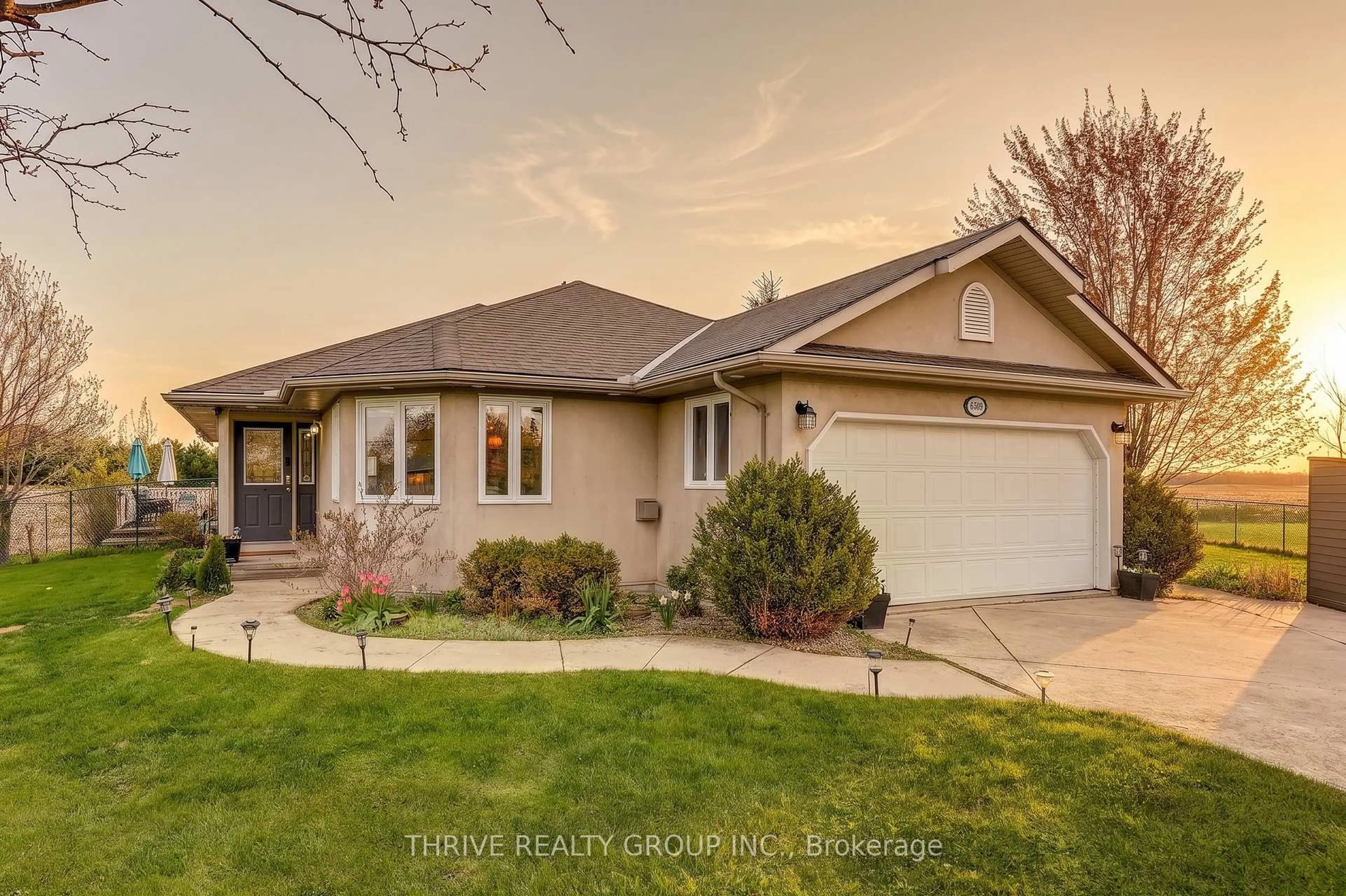 Home with vinyl exterior material, street for 6509 Longwoods Rd, Southwest Middlesex Ontario N0L 1T0