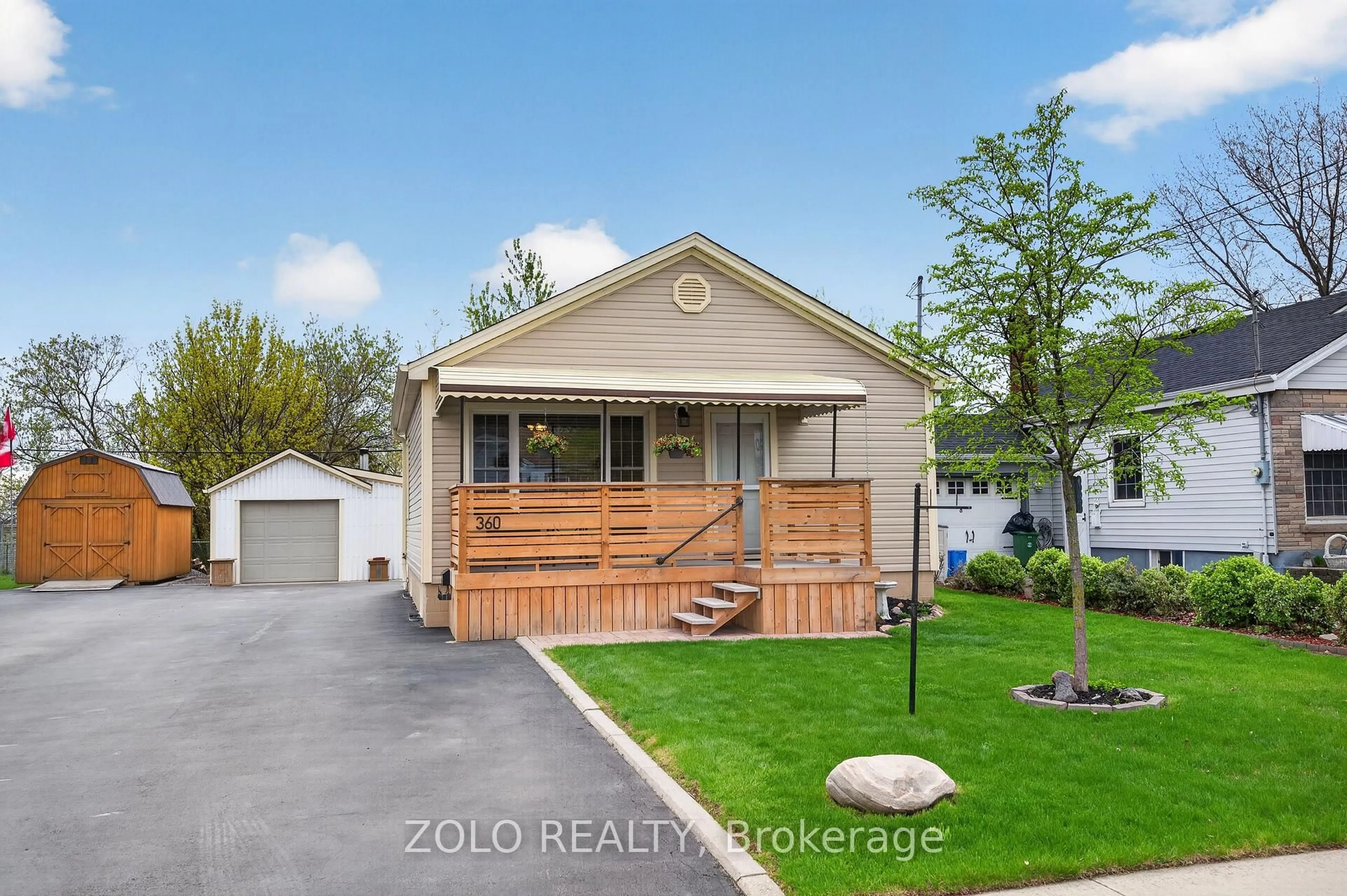 Home with vinyl exterior material, street for 360 Talbot St, Hamilton Ontario L8H 6T4