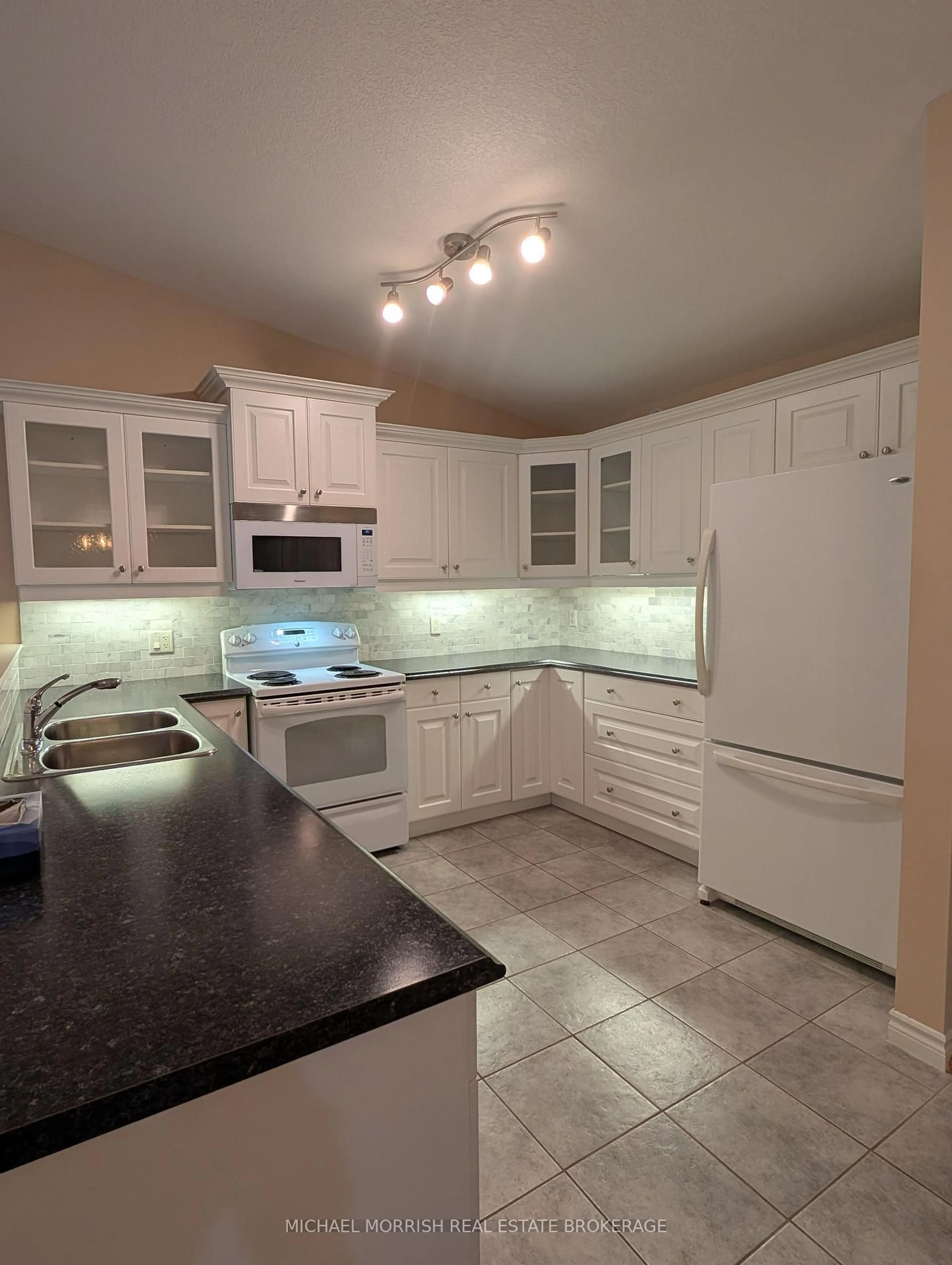 Standard kitchen, ceramic/tile floor for 987 Whetherfield St #39, London North Ontario N6H 0A2
