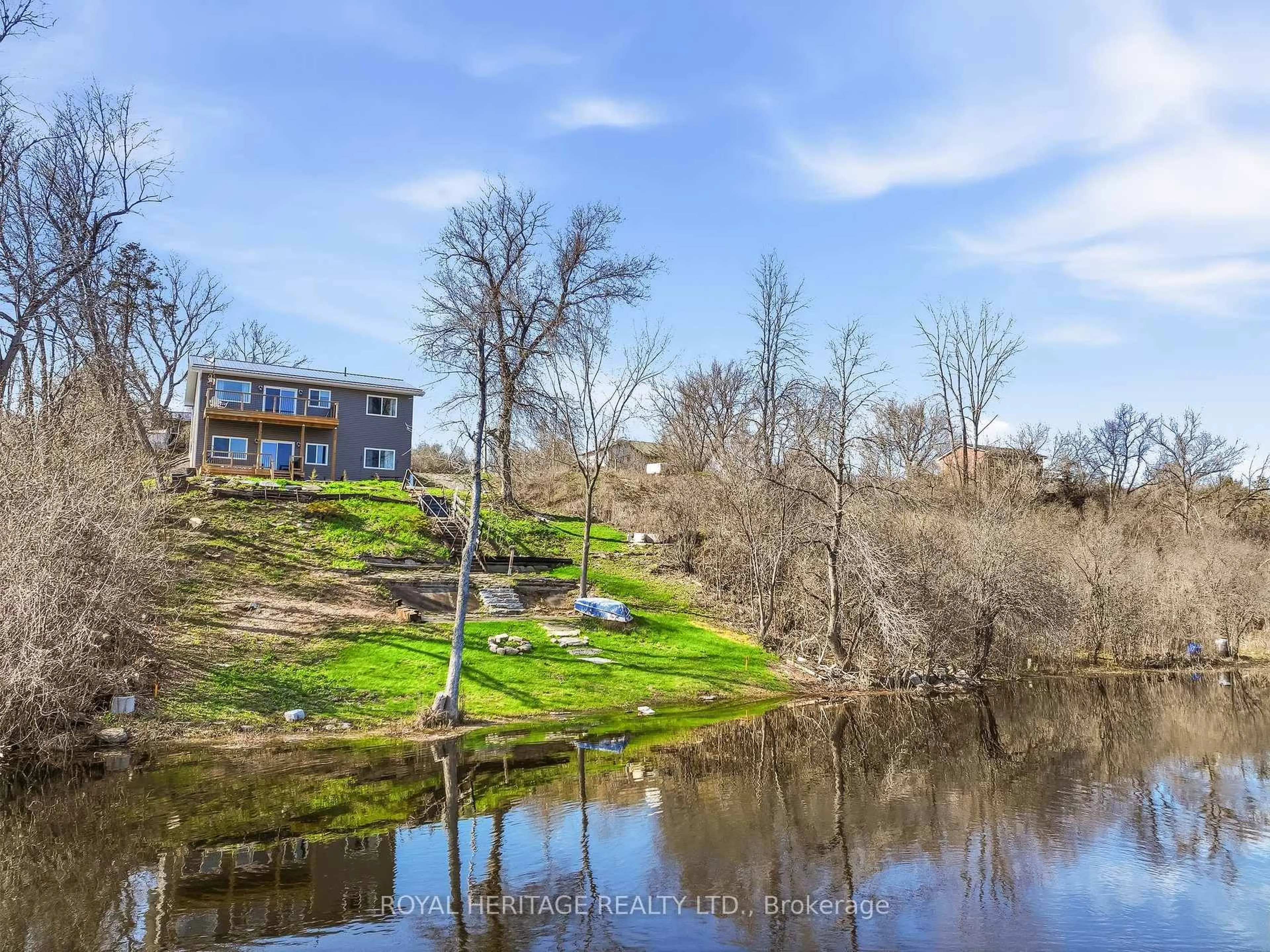 A pic from outside/outdoor area/front of a property/back of a property/a pic from drone, water/lake/river/ocean view for 24 Rock St, Shannonville Ontario K0K 2N0