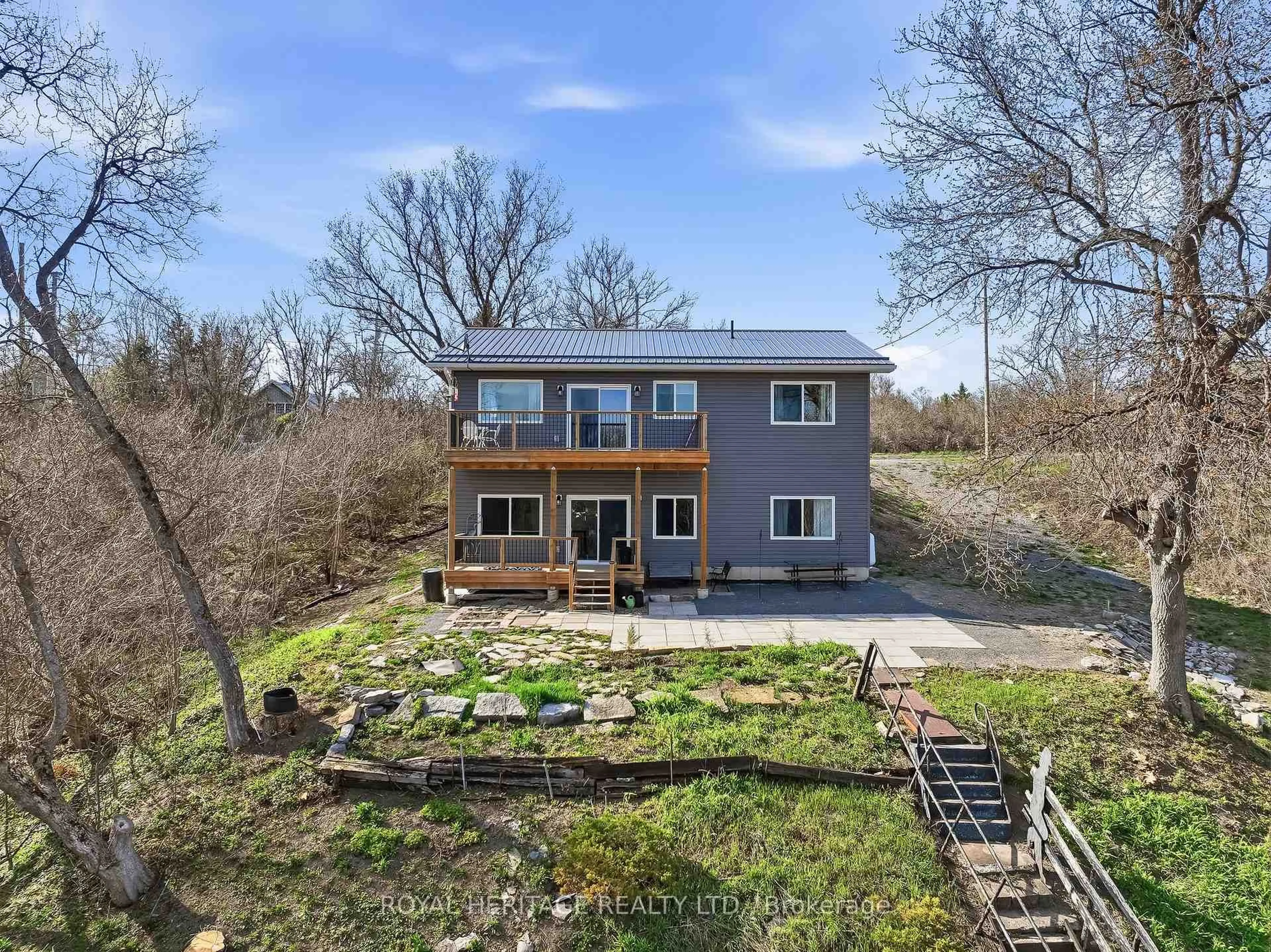 A pic from outside/outdoor area/front of a property/back of a property/a pic from drone, water/lake/river/ocean view for 24 Rock St, Shannonville Ontario K0K 2N0