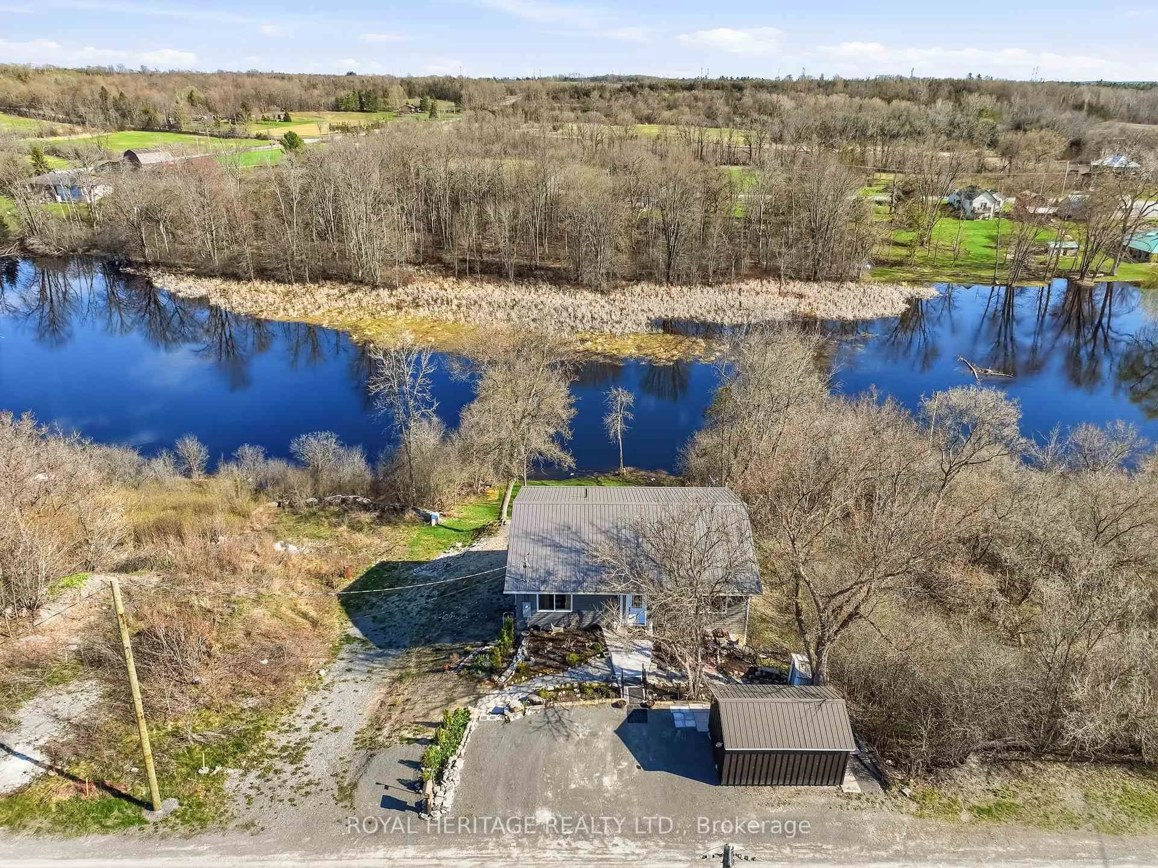 A pic from outside/outdoor area/front of a property/back of a property/a pic from drone, water/lake/river/ocean view for 24 Rock St, Shannonville Ontario K0K 2N0