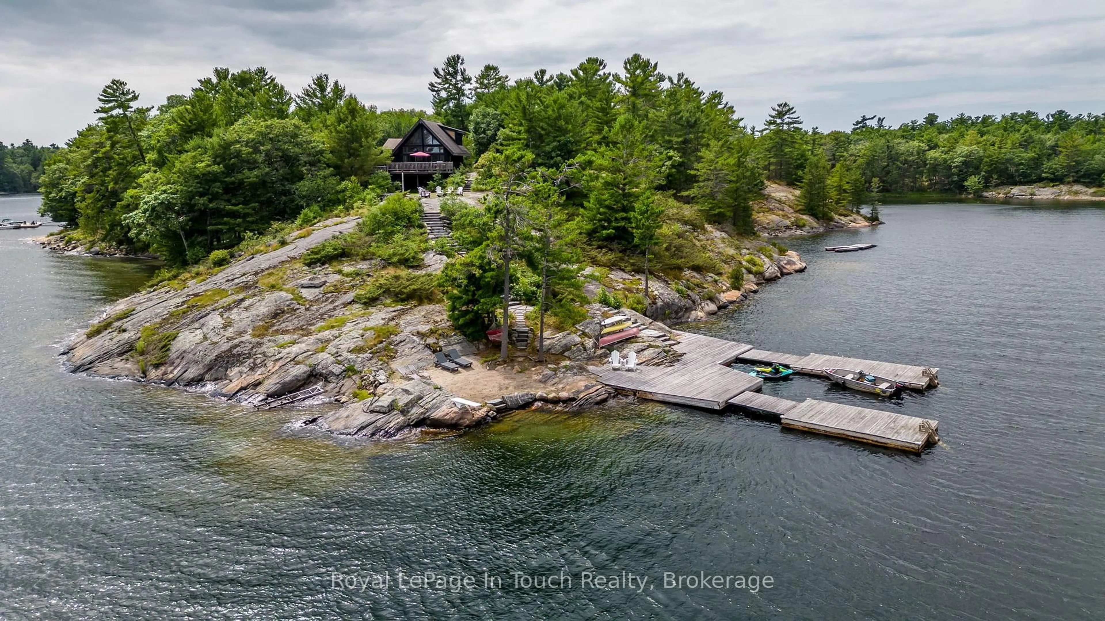 A pic from outside/outdoor area/front of a property/back of a property/a pic from drone, water/lake/river/ocean view for 8 B686 DERBYSHIRE, The Archipelago Ontario P2A 0B7