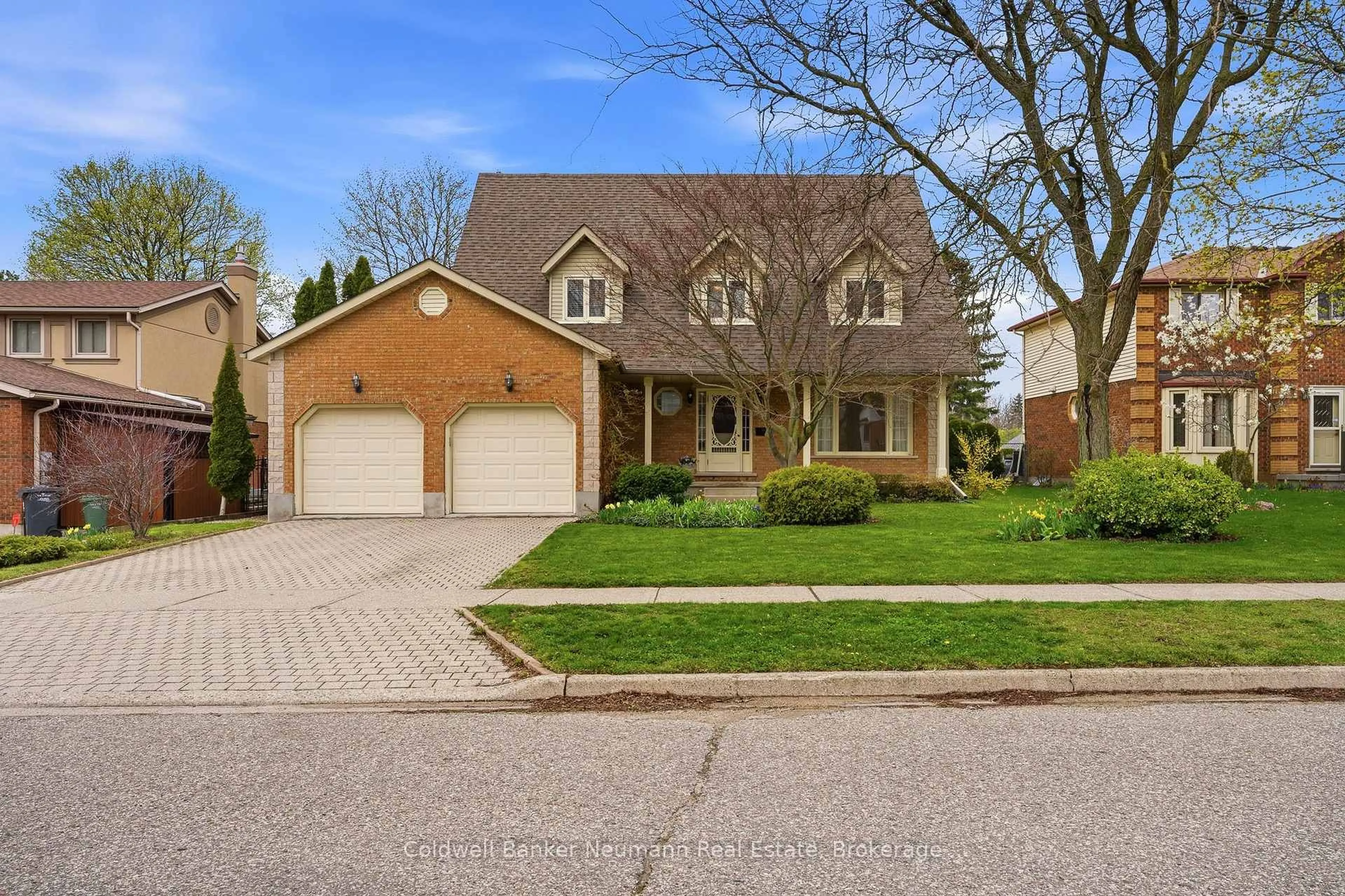 Home with brick exterior material, street for 42 Hands Dr, Guelph Ontario N1G 3H3
