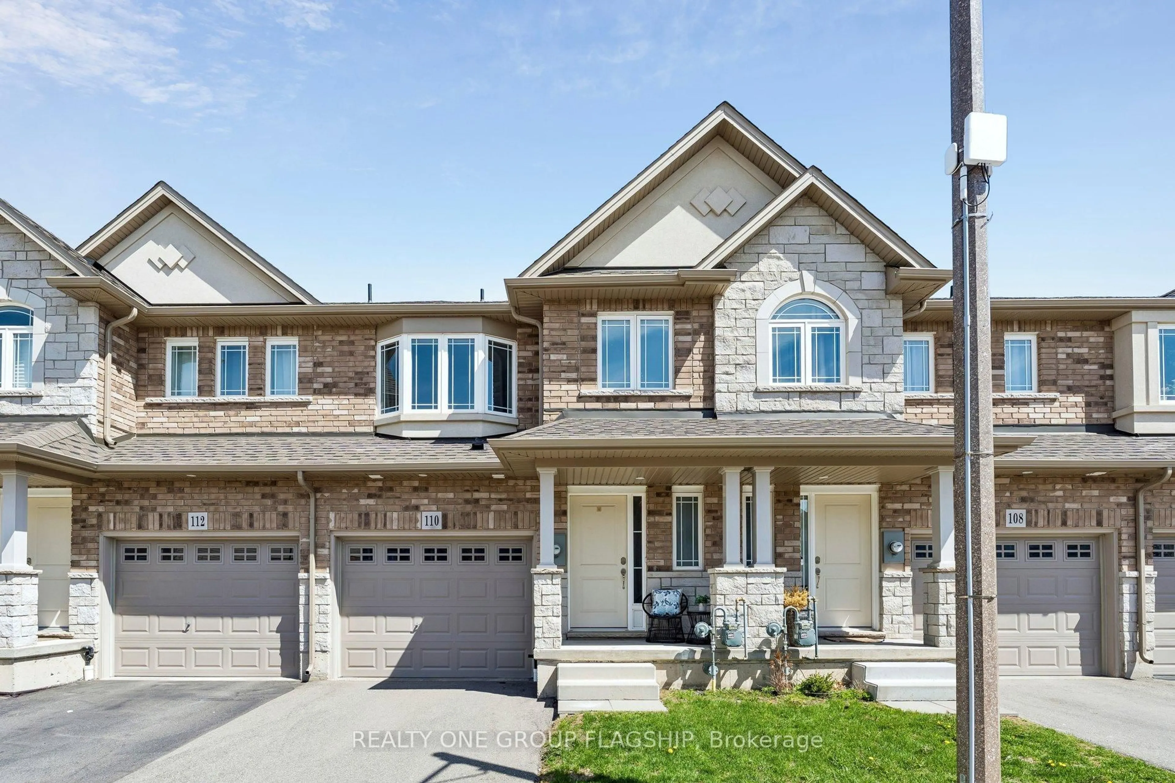 Home with brick exterior material, street for 110 Laguna Village Cres, Hamilton Ontario L0R 1P0