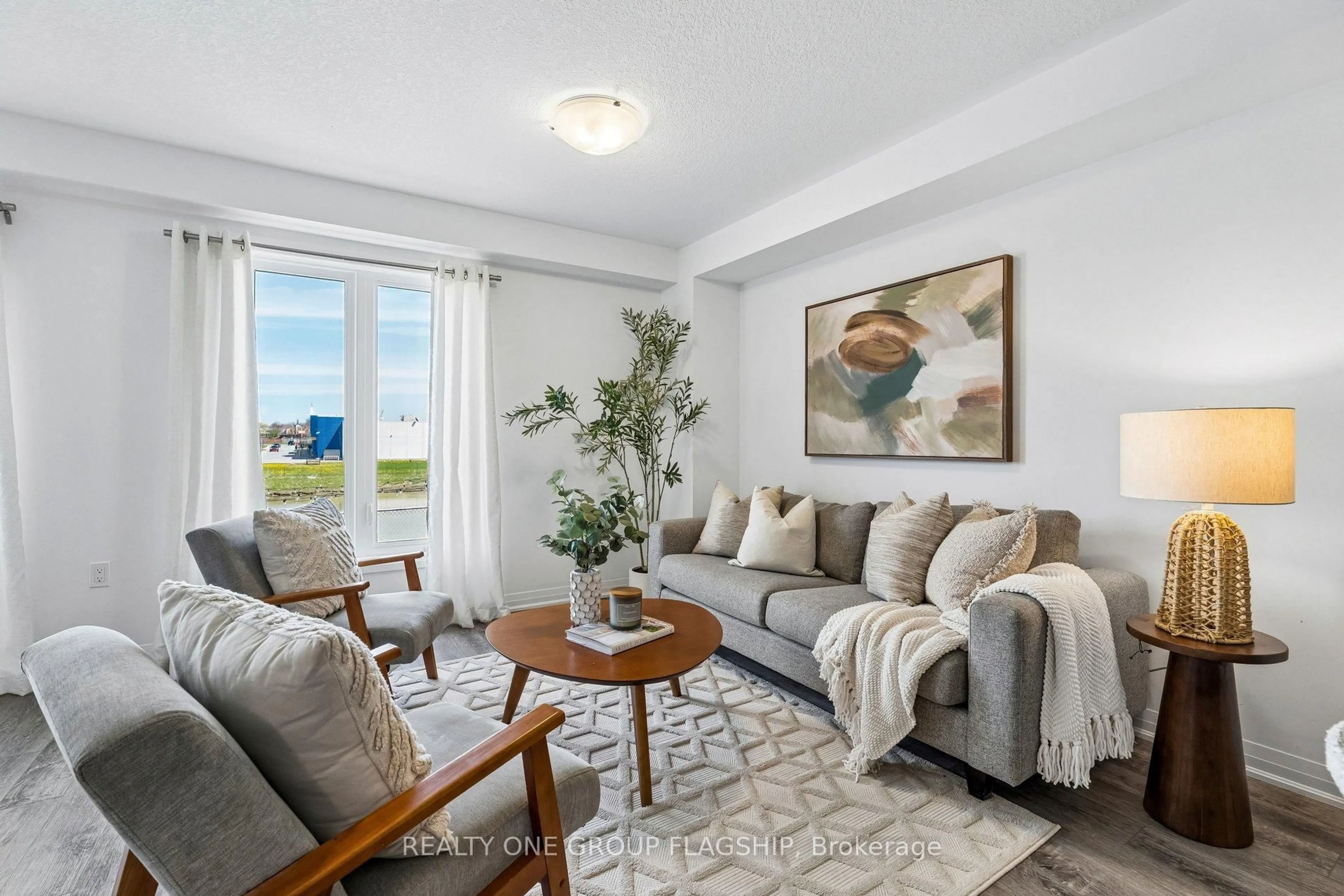 Living room with furniture, unknown for 110 Laguna Village Cres, Hamilton Ontario L0R 1P0