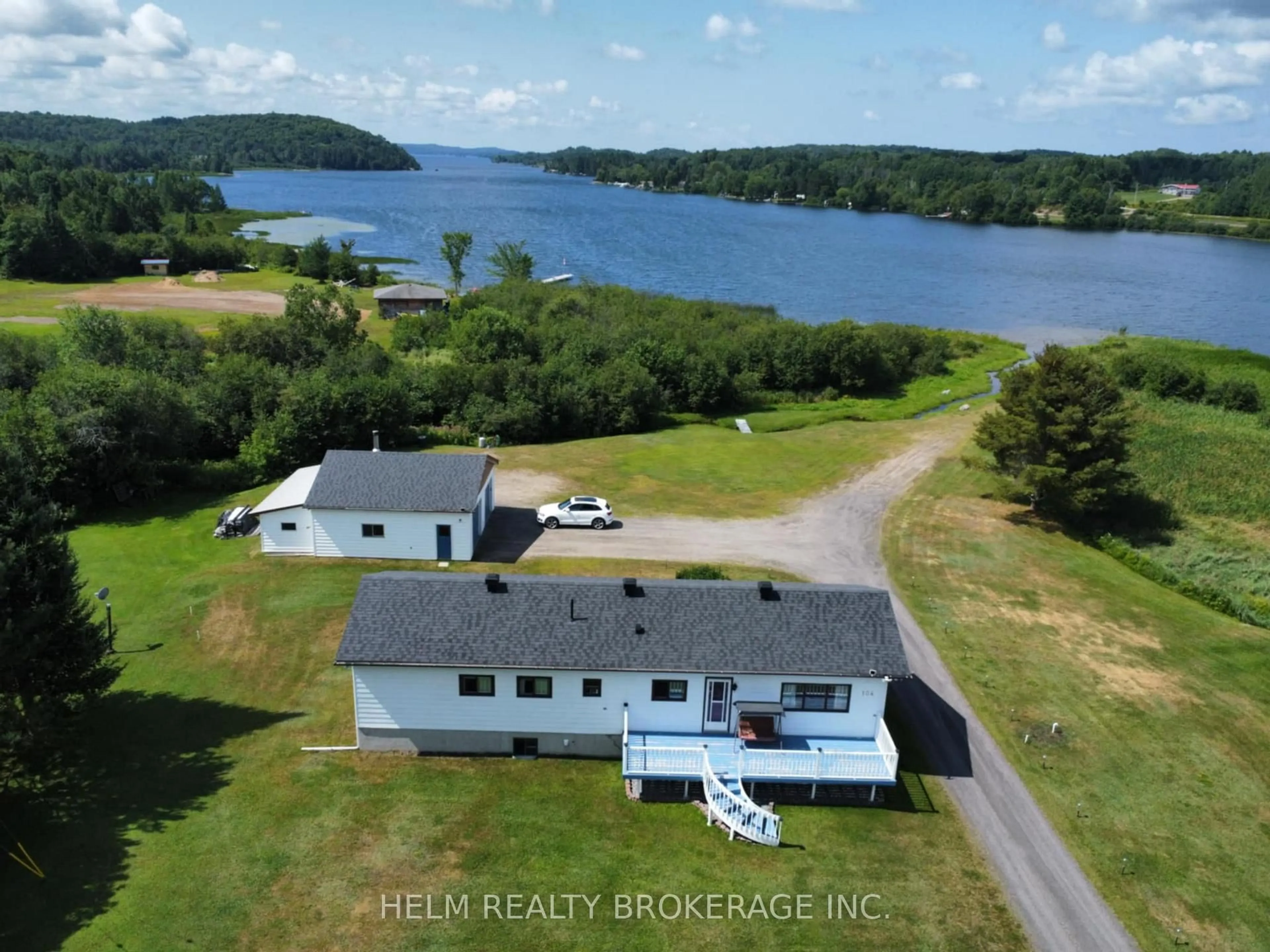 A pic from outside/outdoor area/front of a property/back of a property/a pic from drone, water/lake/river/ocean view for 104 Church St, Bonfield Ontario P0H 1E0