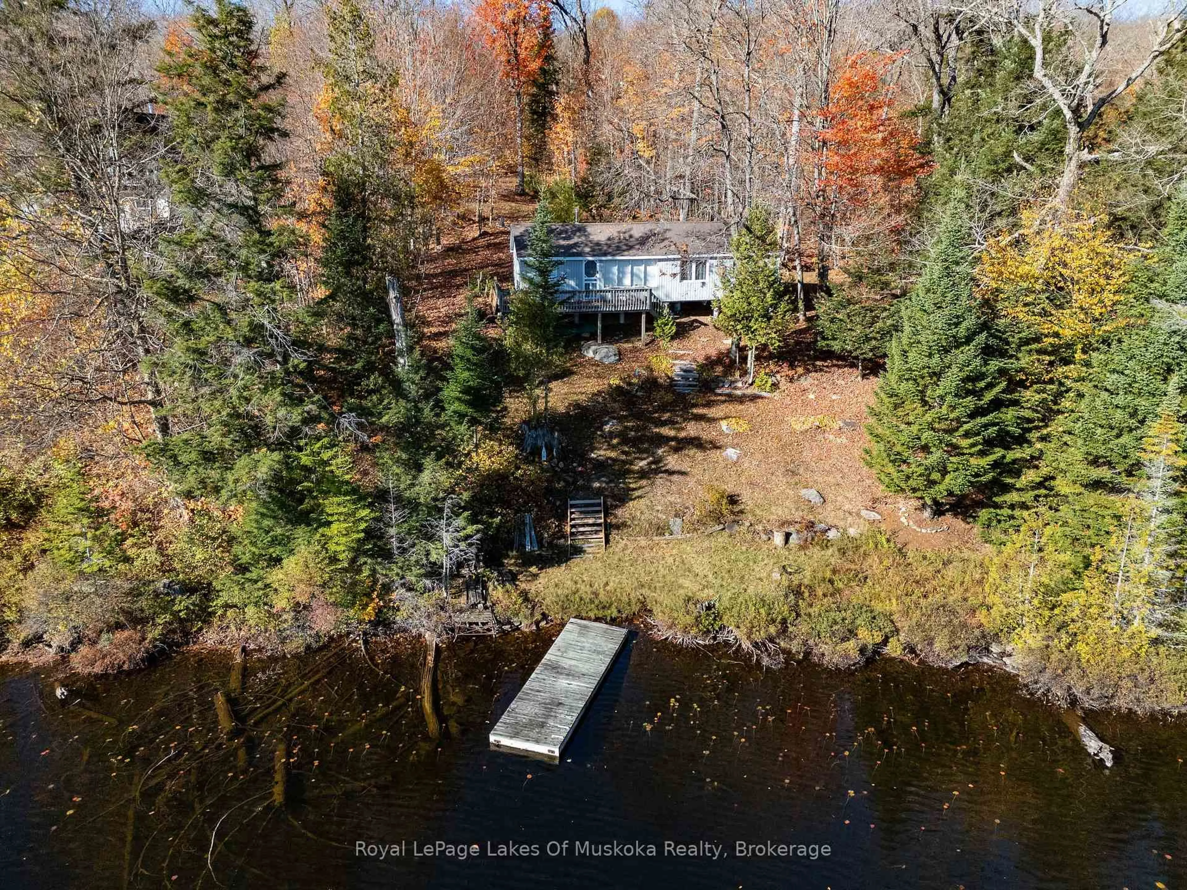 A pic from outside/outdoor area/front of a property/back of a property/a pic from drone, water/lake/river/ocean view for 1119 GRIST MILL Lane, Algonquin Highlands Ontario P0A 1E0
