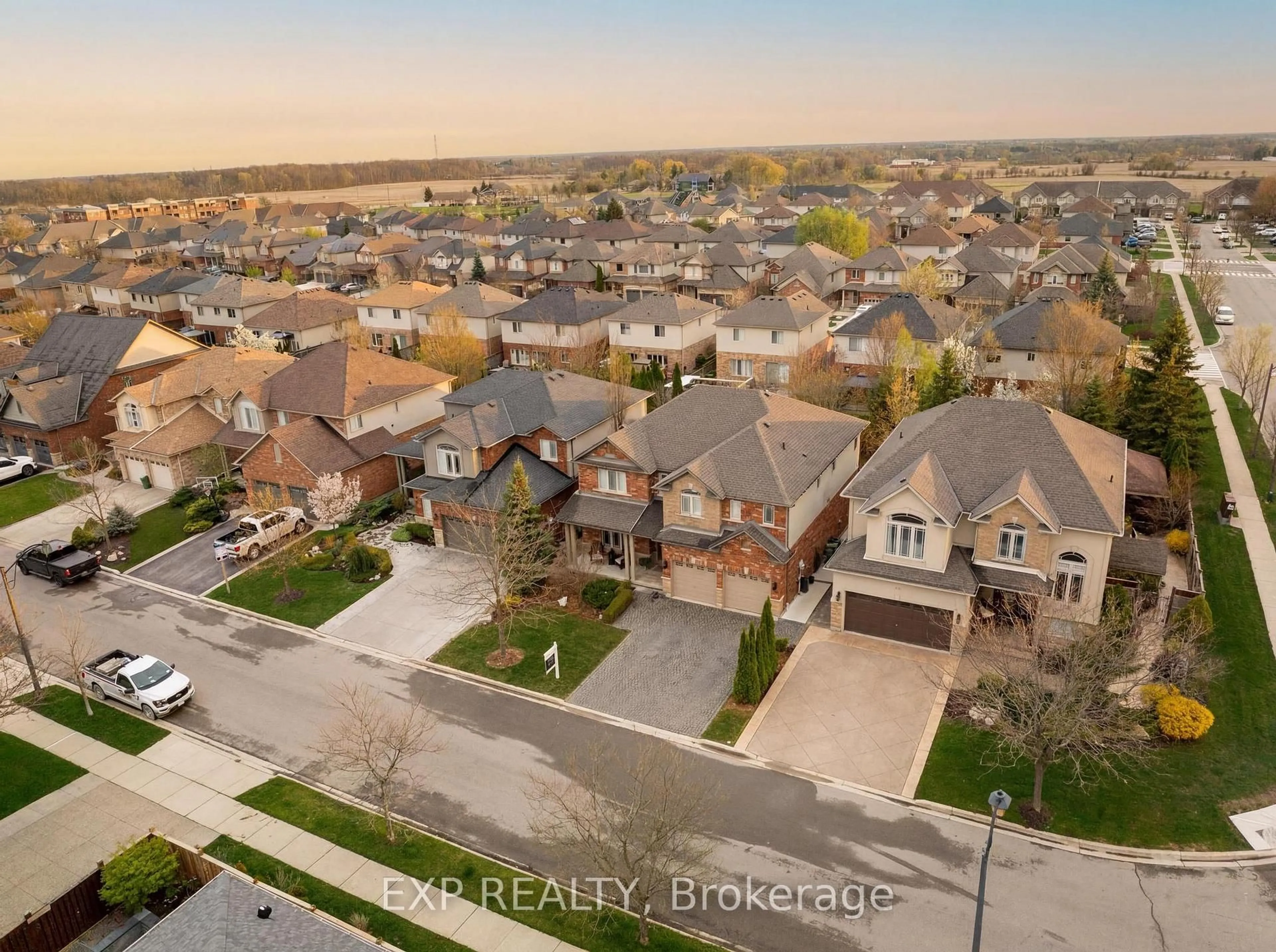 A pic from outside/outdoor area/front of a property/back of a property/a pic from drone, street for 129 Magnificent Way, Hamilton Ontario L0R 1C0