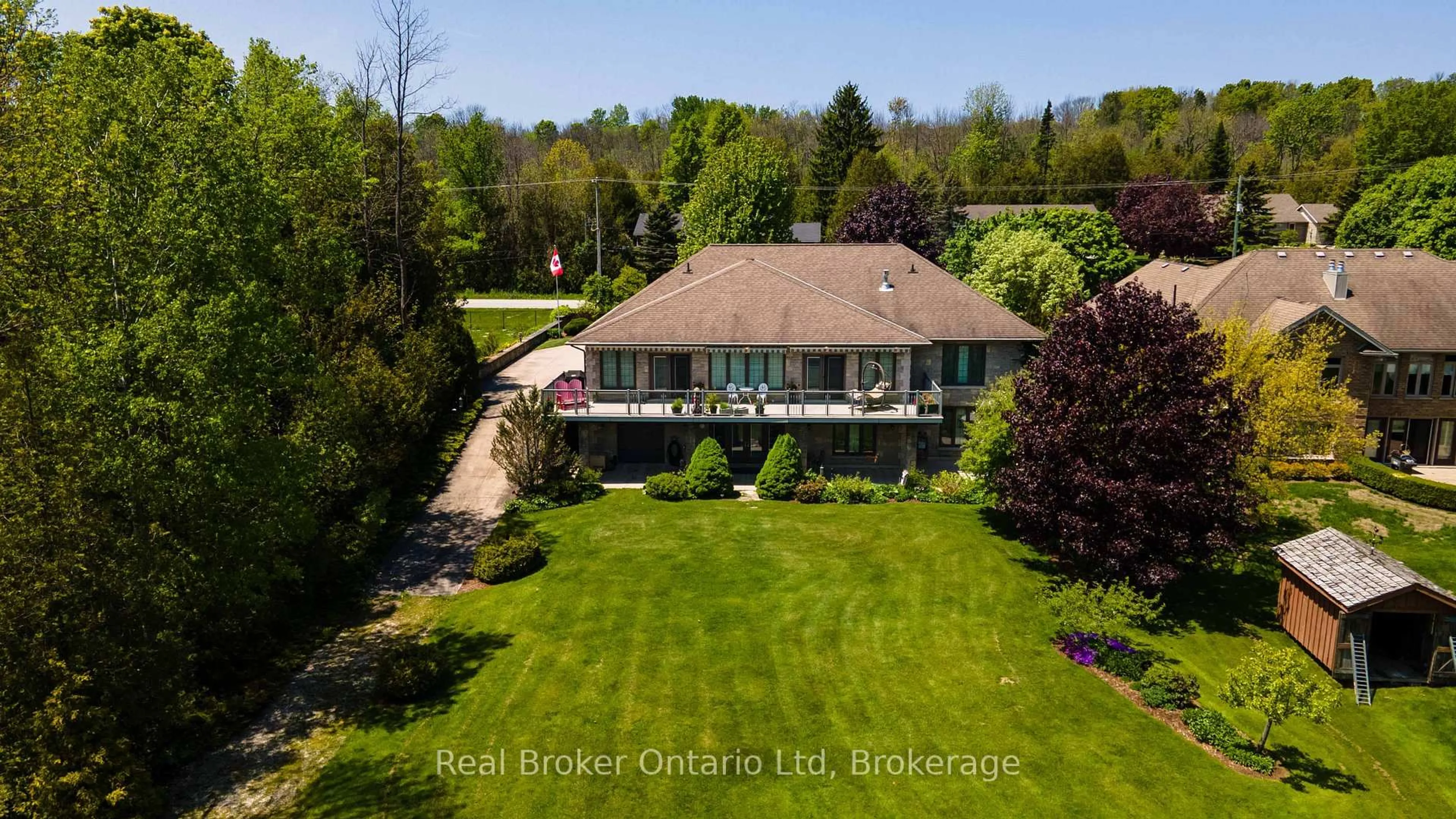 A pic from outside/outdoor area/front of a property/back of a property/a pic from drone, water/lake/river/ocean view for 361 Balmy Beach Rd, Georgian Bluffs Ontario N4K 5N4