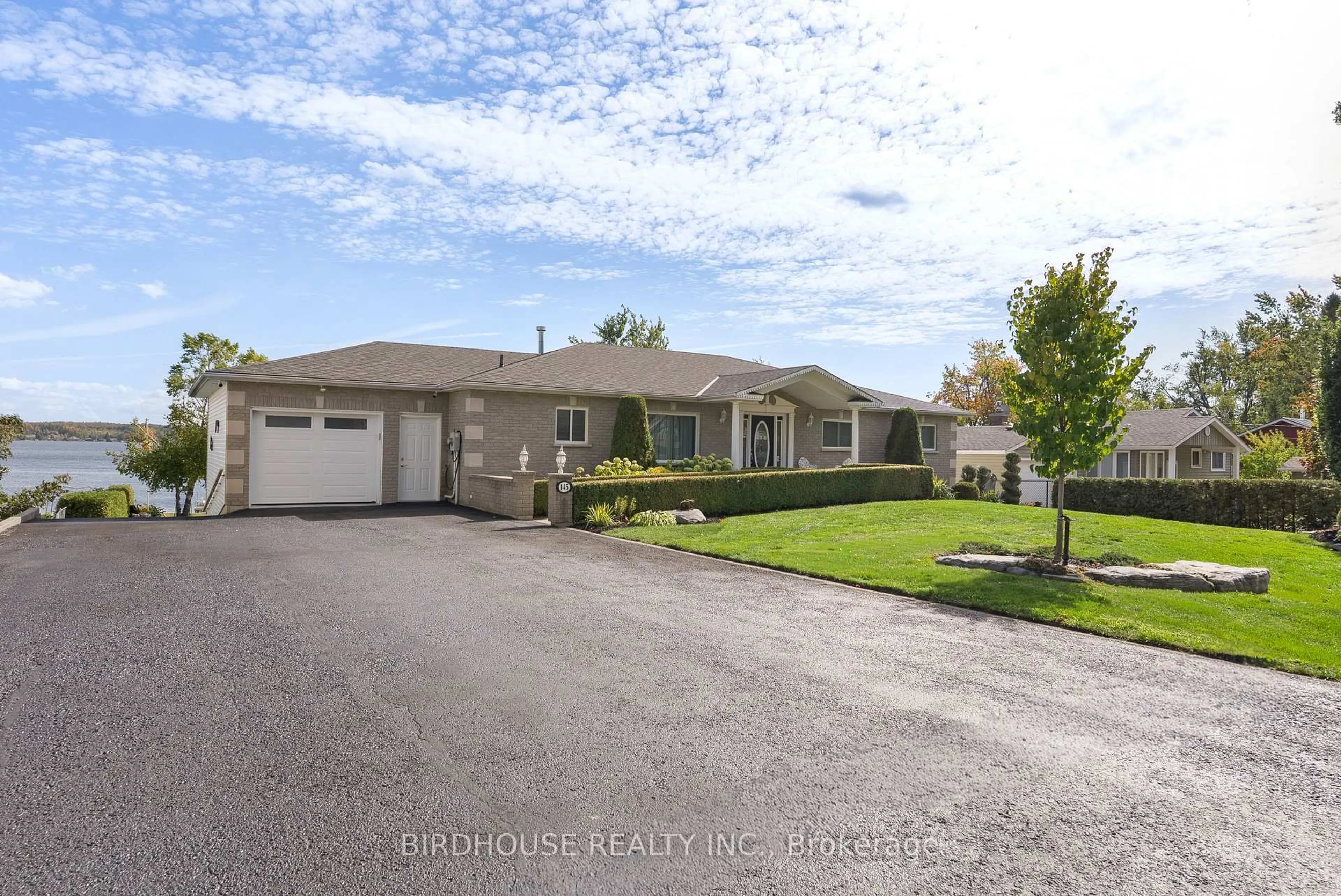 A pic from outside/outdoor area/front of a property/back of a property/a pic from drone, street for 145 Beehive Dr, Kawartha Lakes Ontario K0M 1G0