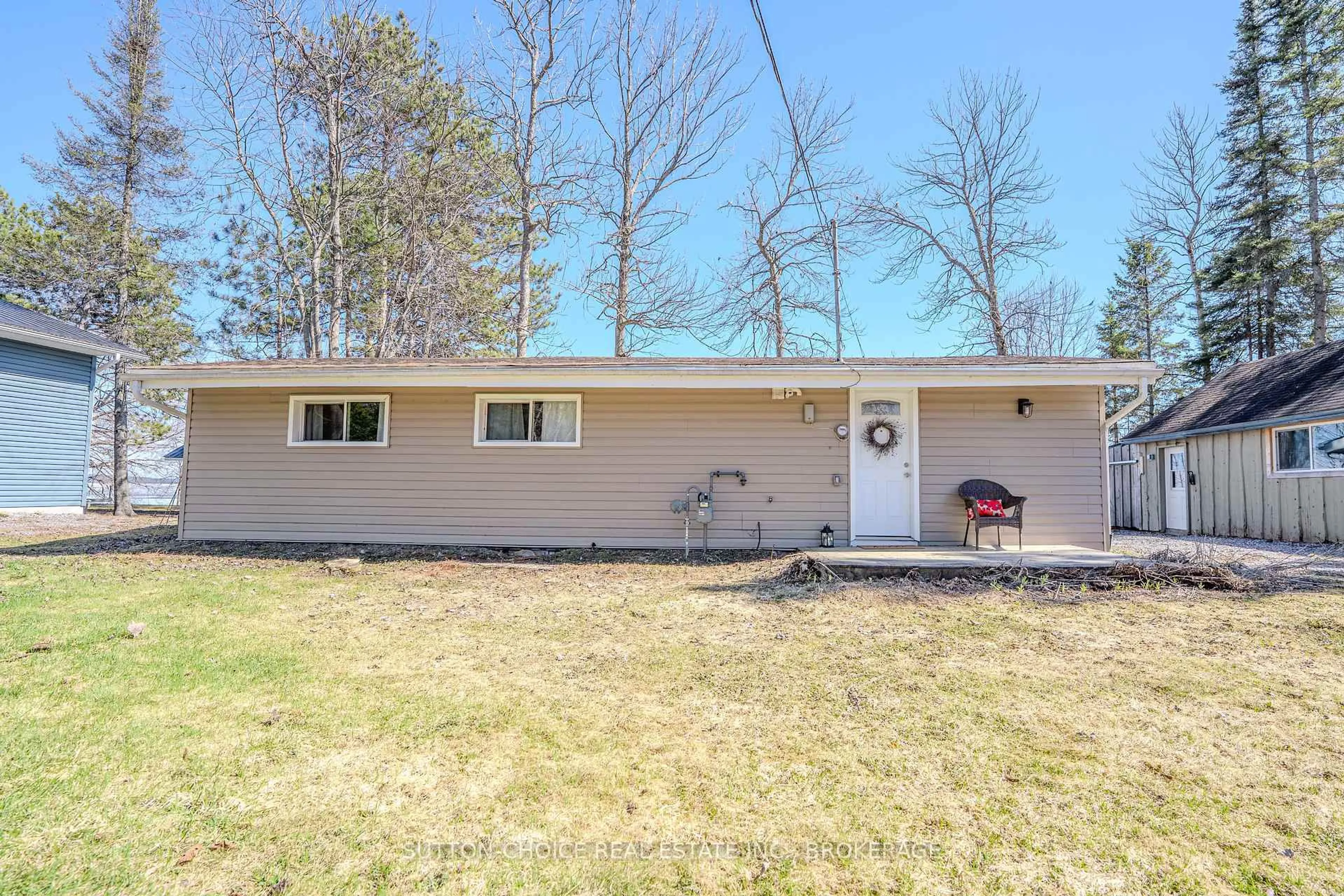 Home with vinyl exterior material, street for 411 Jocko Point Rd, North Bay Ontario P1B 8G5