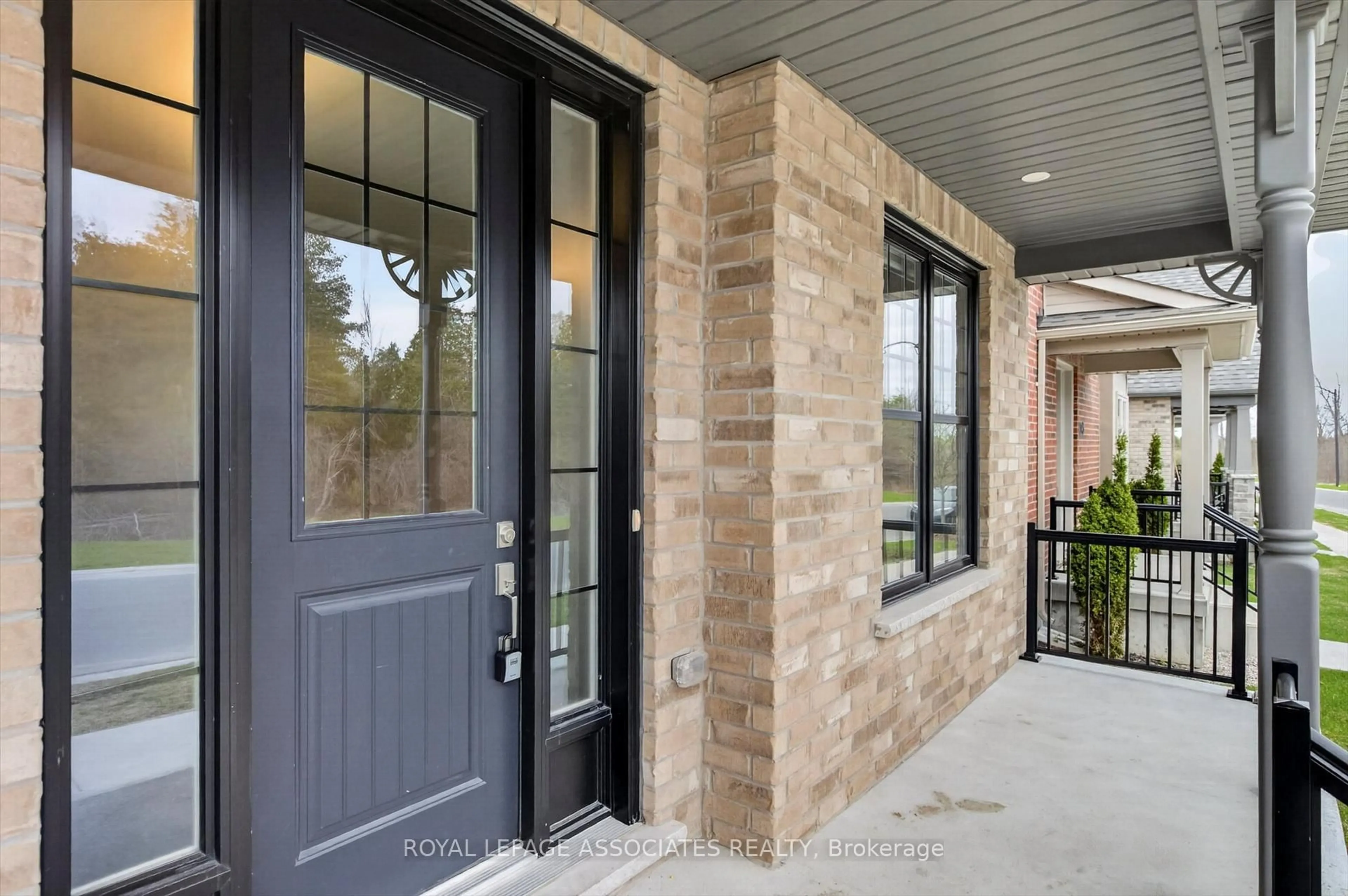 Home with brick exterior material, street for 1047 Rippingale Tr, Peterborough Ontario K9H 0J8
