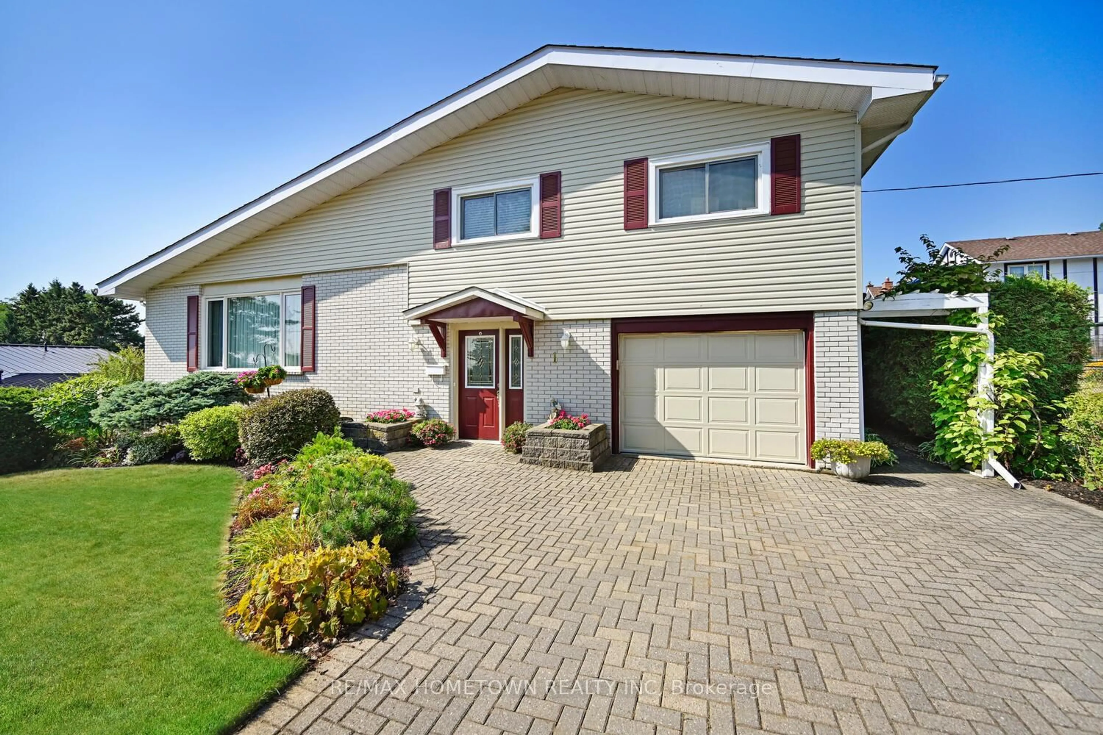 Home with brick exterior material, street for 1 Hardy Cres, Brockville Ontario K6V 3A2