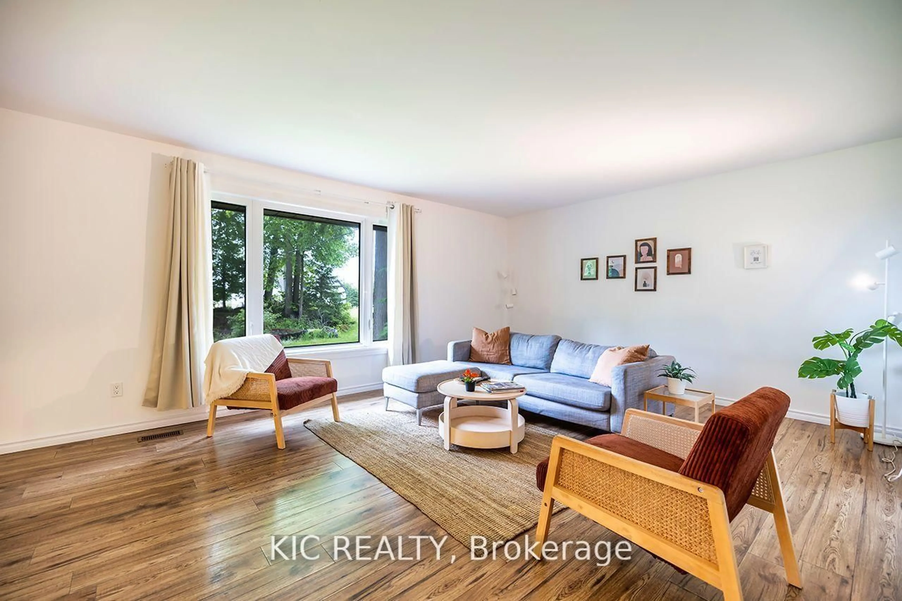 Living room with furniture, wood/laminate floor for 6 Sumcot Dr, Trent Lakes Ontario K0L 1J0