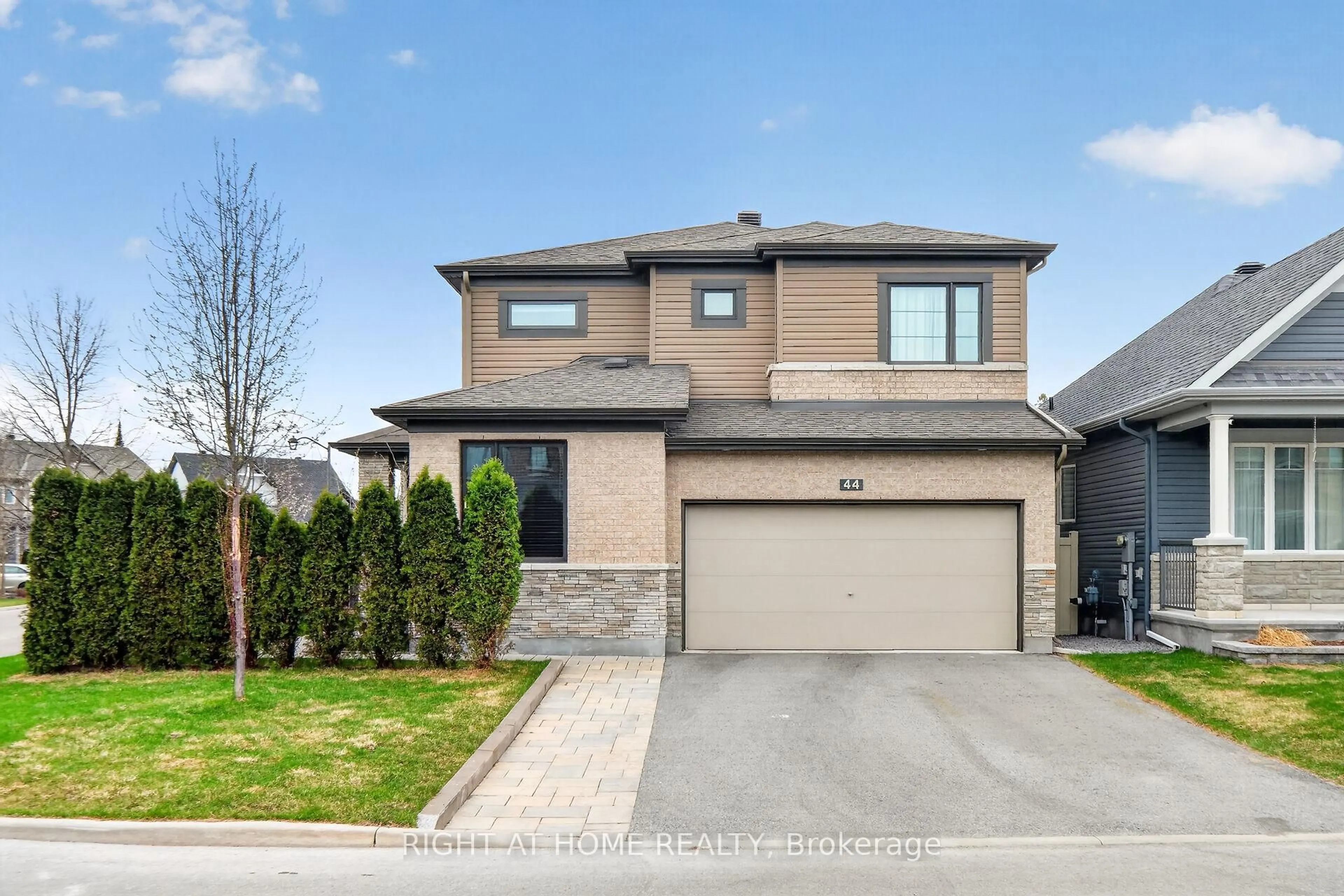 Home with brick exterior material, street for 44 Hawks Landing Cres, Stittsville Ontario K2S 1W1