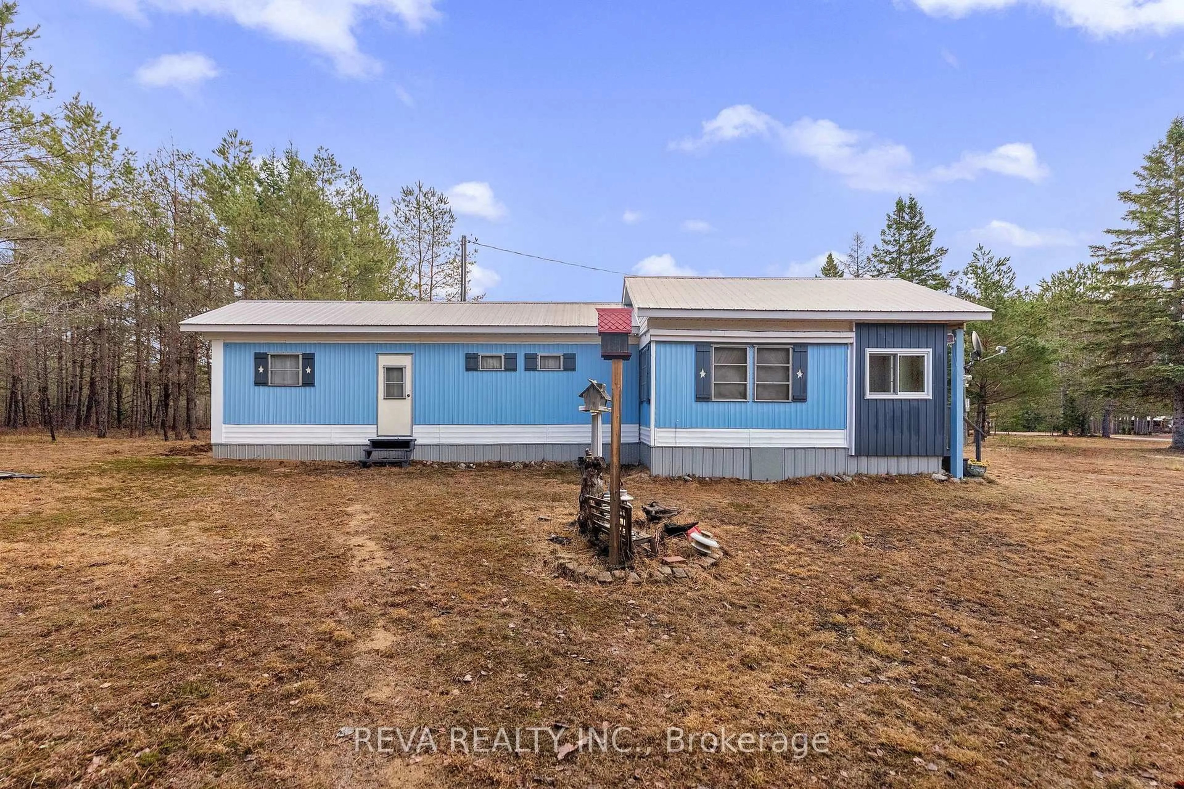 A pic from outside/outdoor area/front of a property/back of a property/a pic from drone, unknown for 15 Center Rd, Maynooth Ontario K0L 2K0