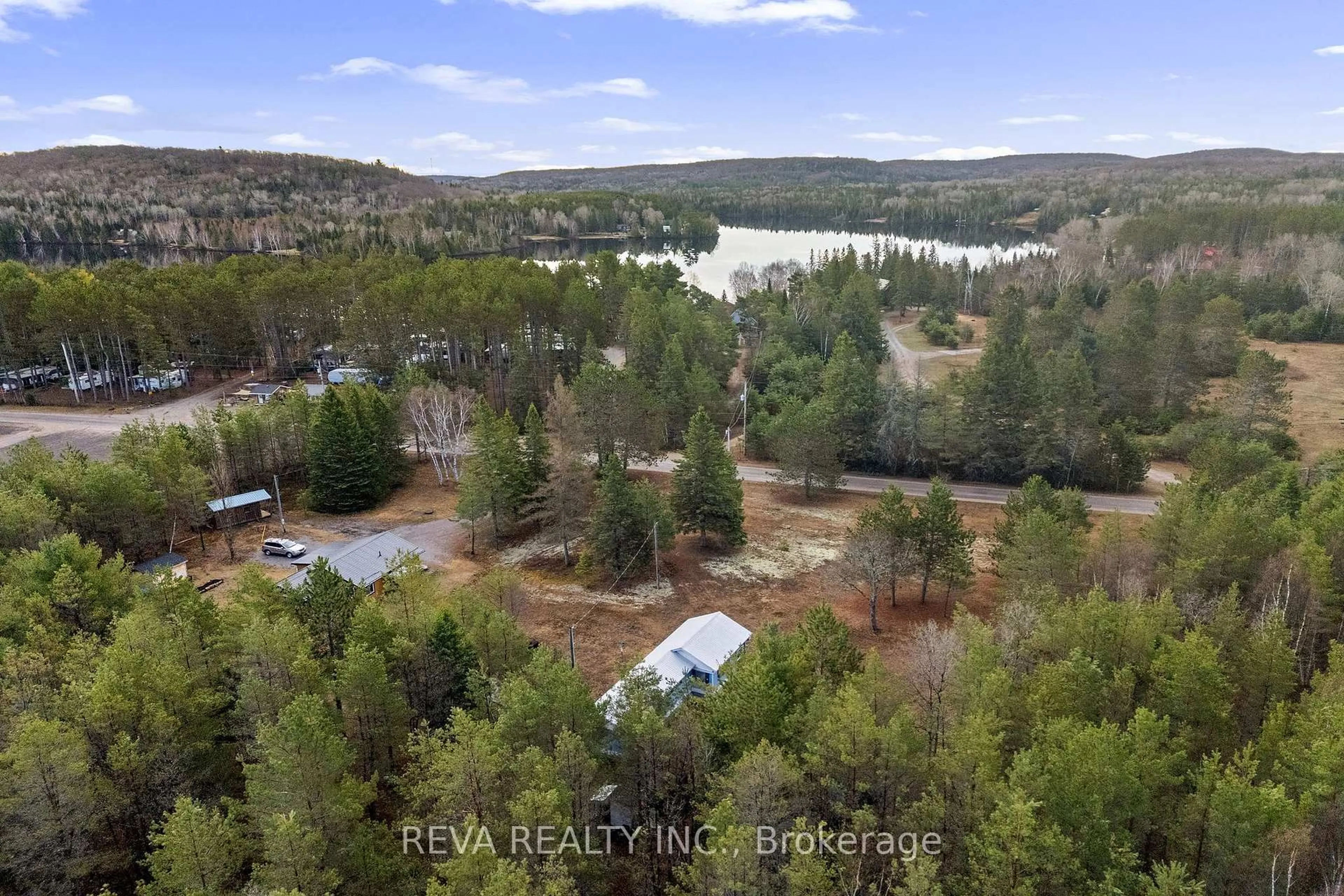 A pic from outside/outdoor area/front of a property/back of a property/a pic from drone, water/lake/river/ocean view for 15 Center Rd, Maynooth Ontario K0L 2K0