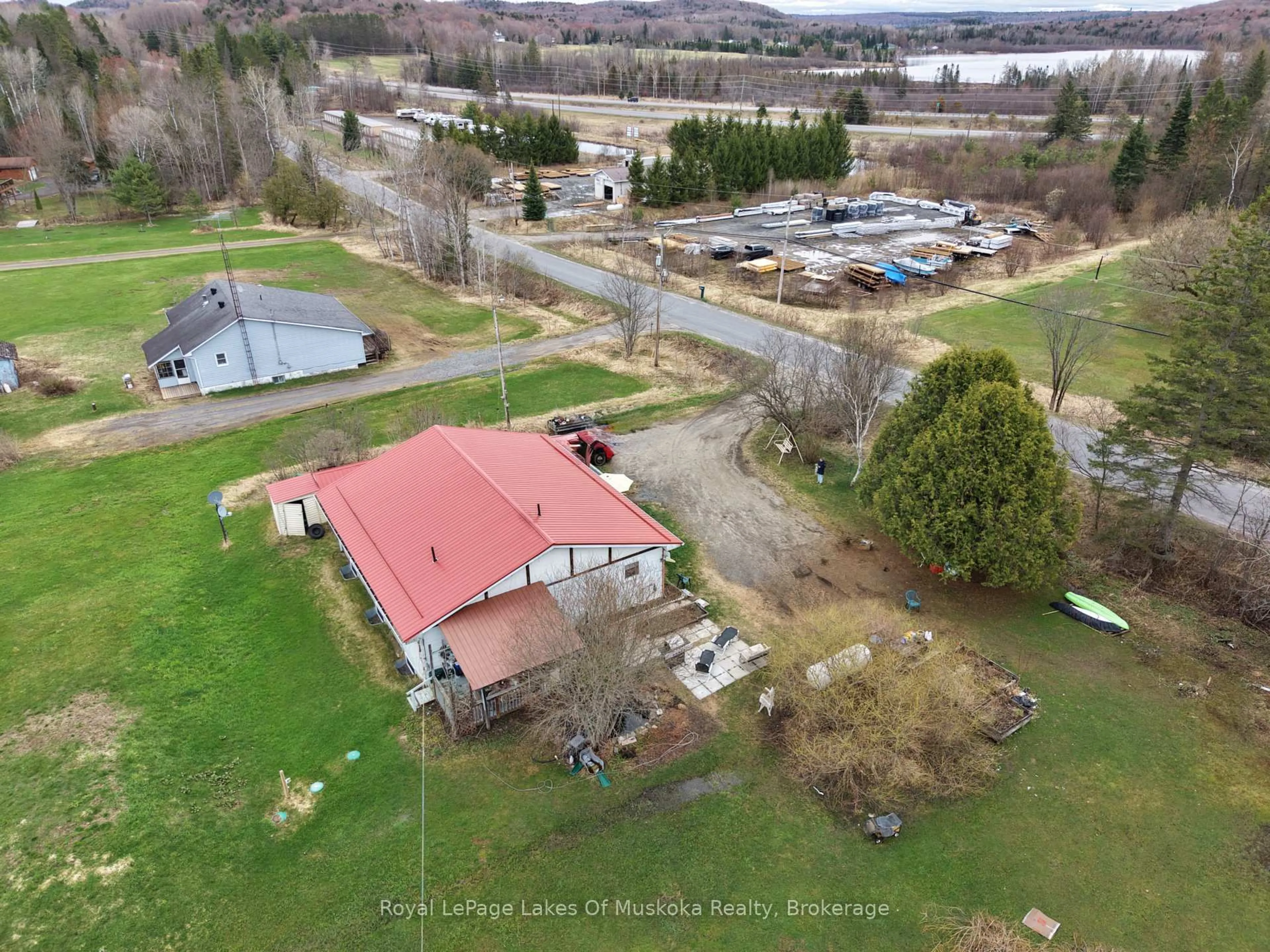 A pic from outside/outdoor area/front of a property/back of a property/a pic from drone, water/lake/river/ocean view for 250 Stephenson Rd 12 W Rd, Huntsville Ontario P0B 1M0