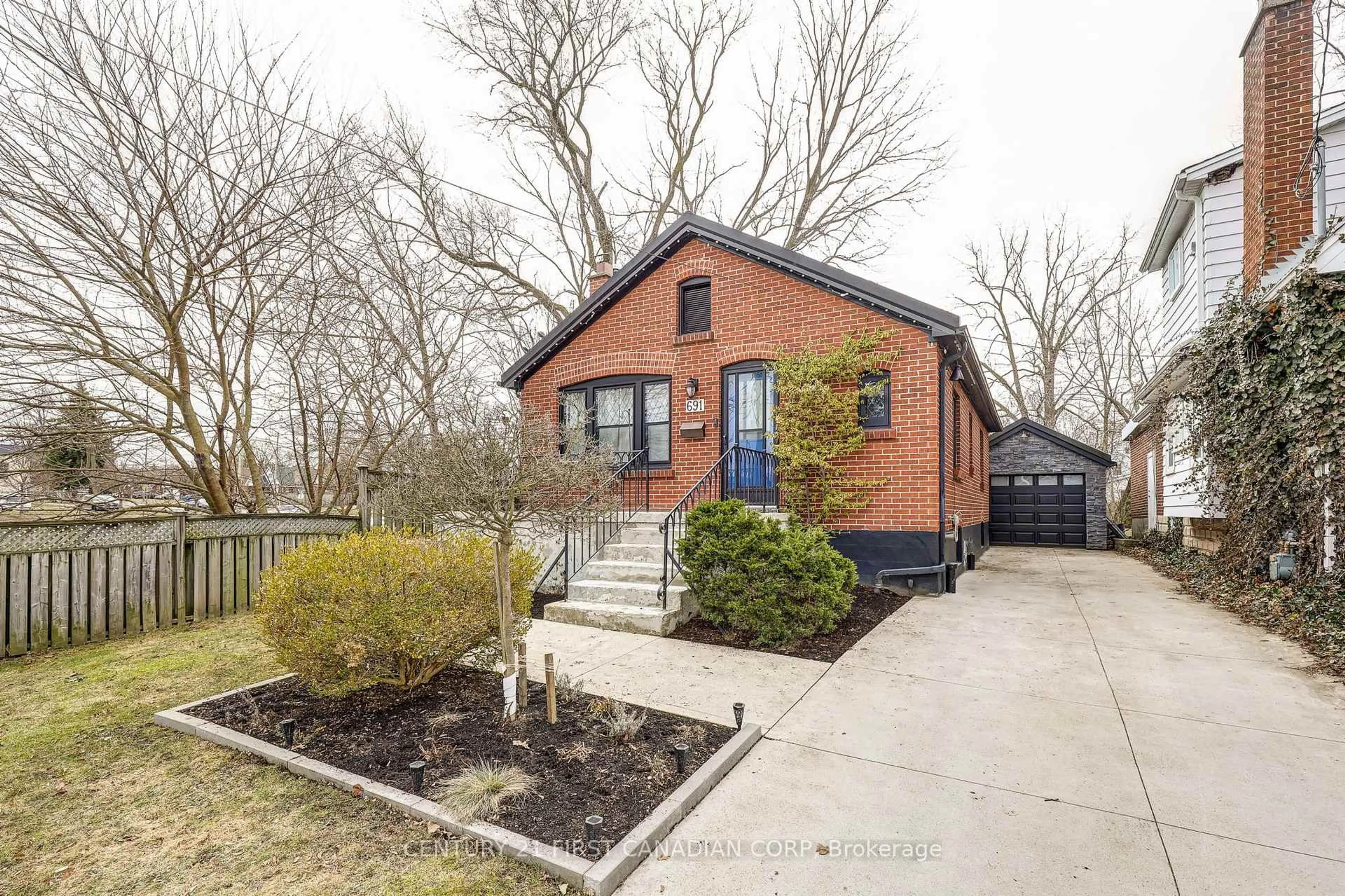 Home with brick exterior material, street for 691 EMERY St, London South Ontario N6C 2G3