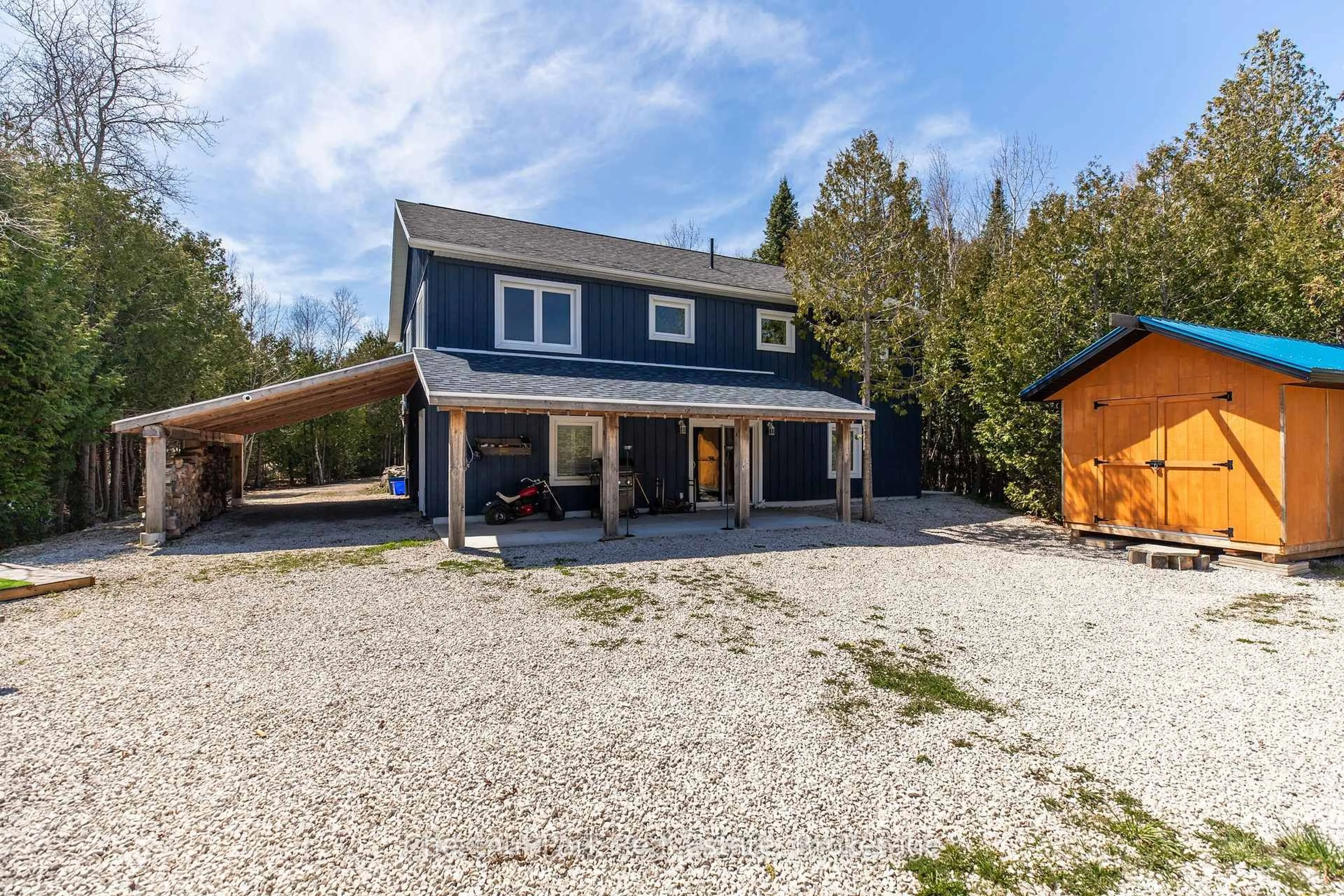 A pic from outside/outdoor area/front of a property/back of a property/a pic from drone, street for 4576 Highway 6, Northern Bruce Peninsula Ontario N0H 1Z0