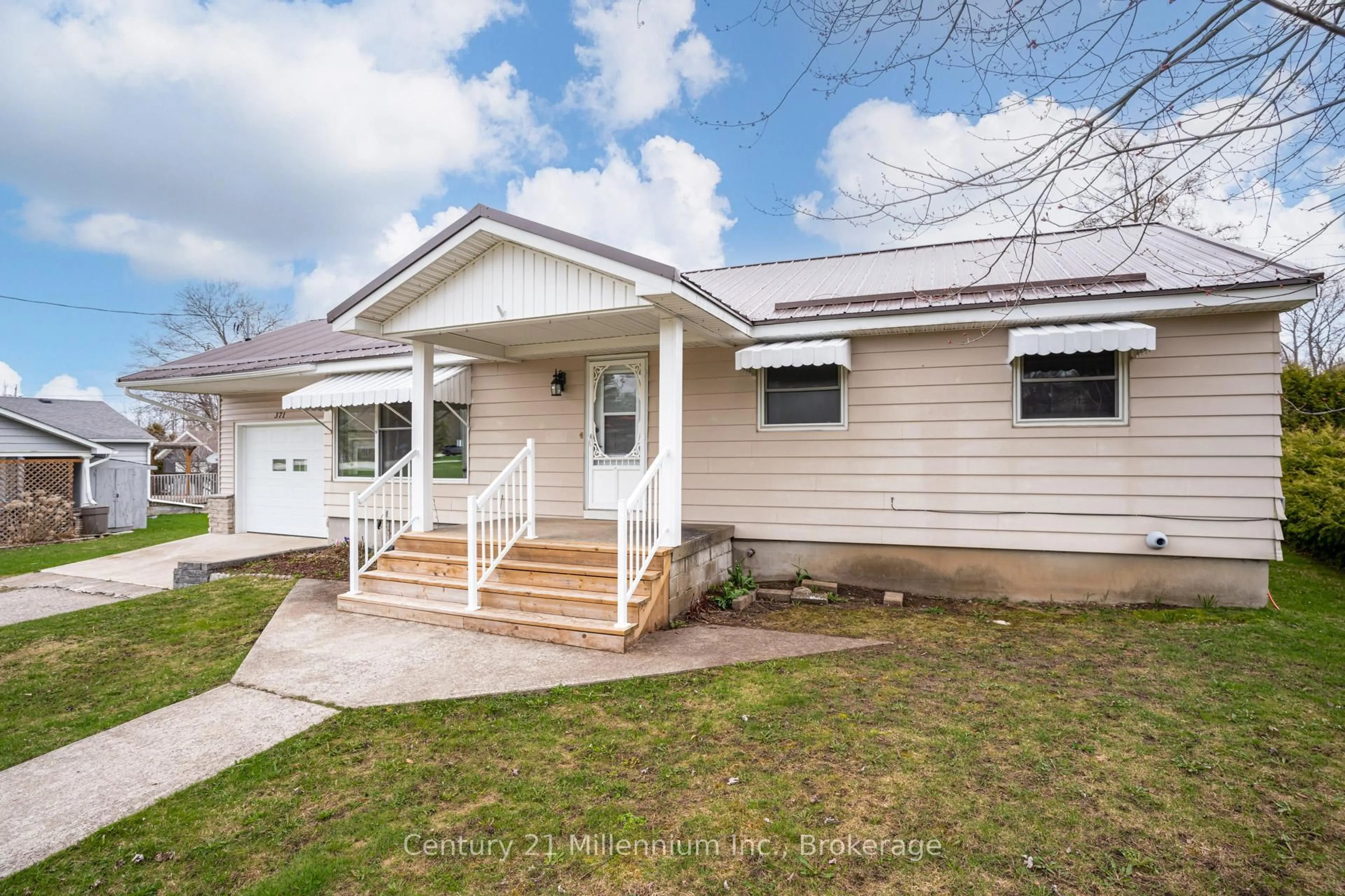 Home with vinyl exterior material, street for 371 Hunter St, South Bruce Peninsula Ontario N0H 2T0