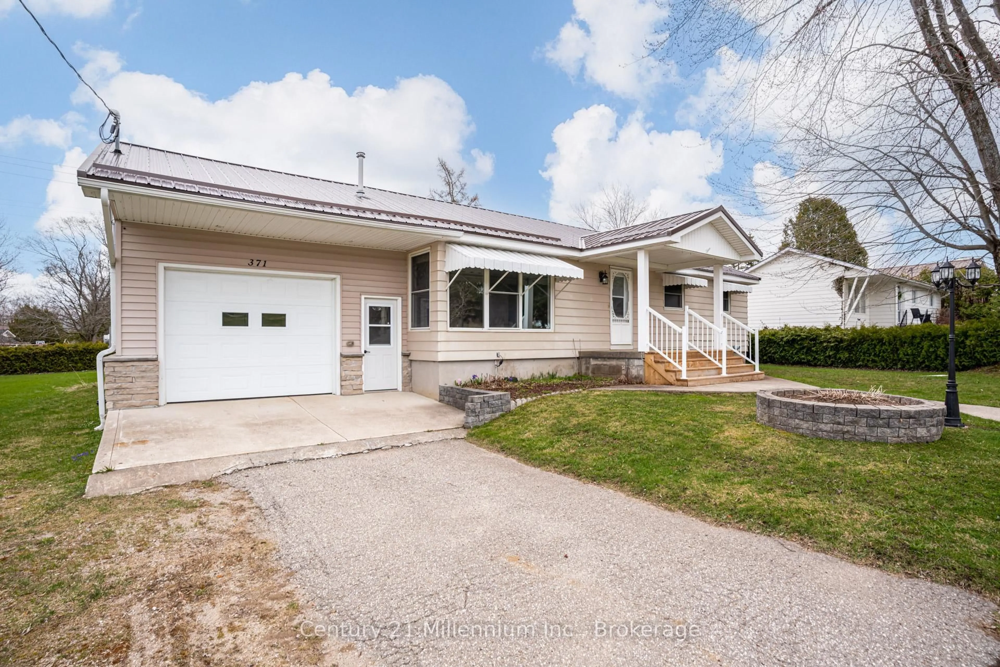 Home with vinyl exterior material, street for 371 Hunter St, South Bruce Peninsula Ontario N0H 2T0