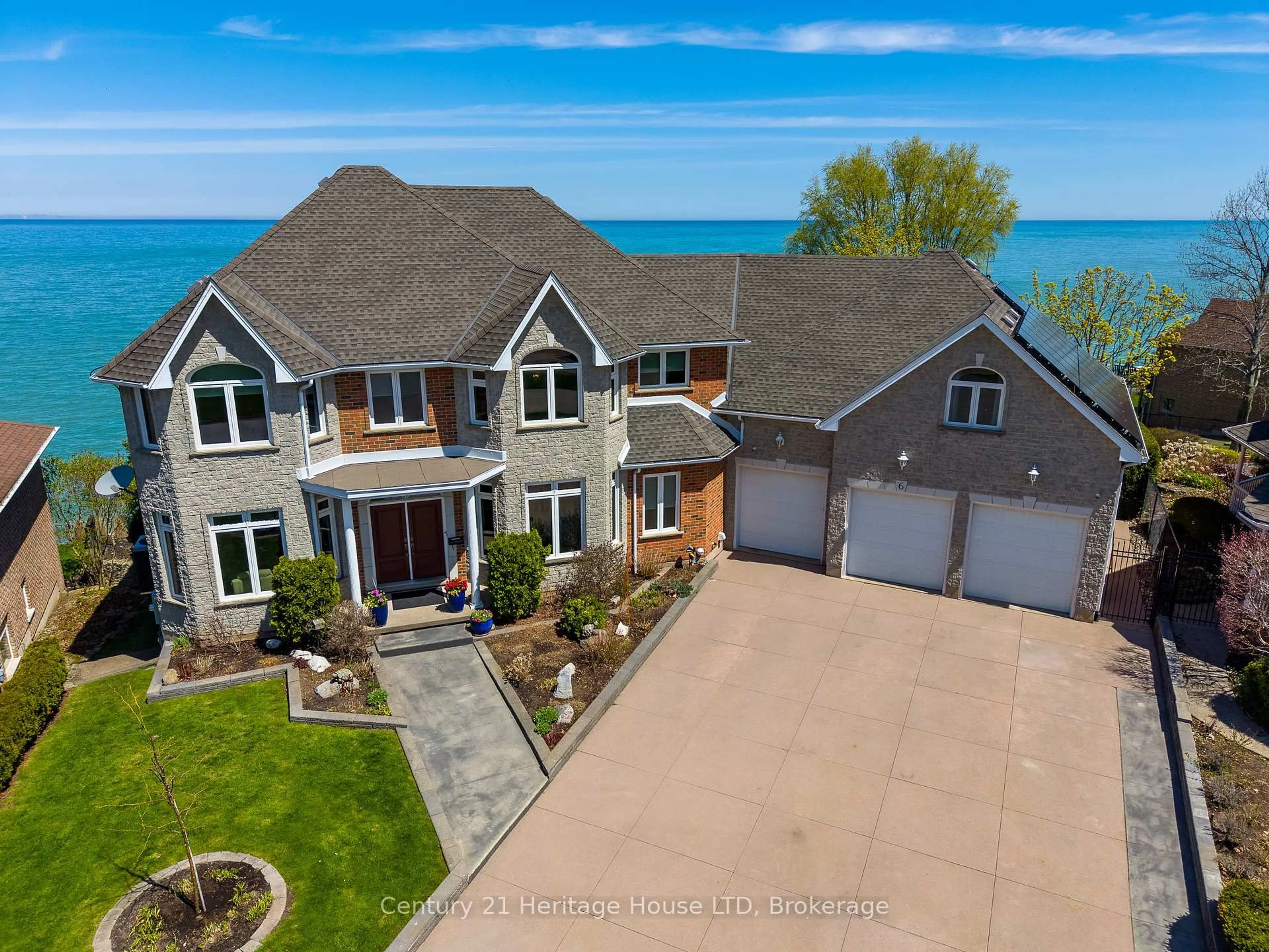 A pic from outside/outdoor area/front of a property/back of a property/a pic from drone, water/lake/river/ocean view for 6 Jacob's Landing, Grimsby Ontario L3M 5G7