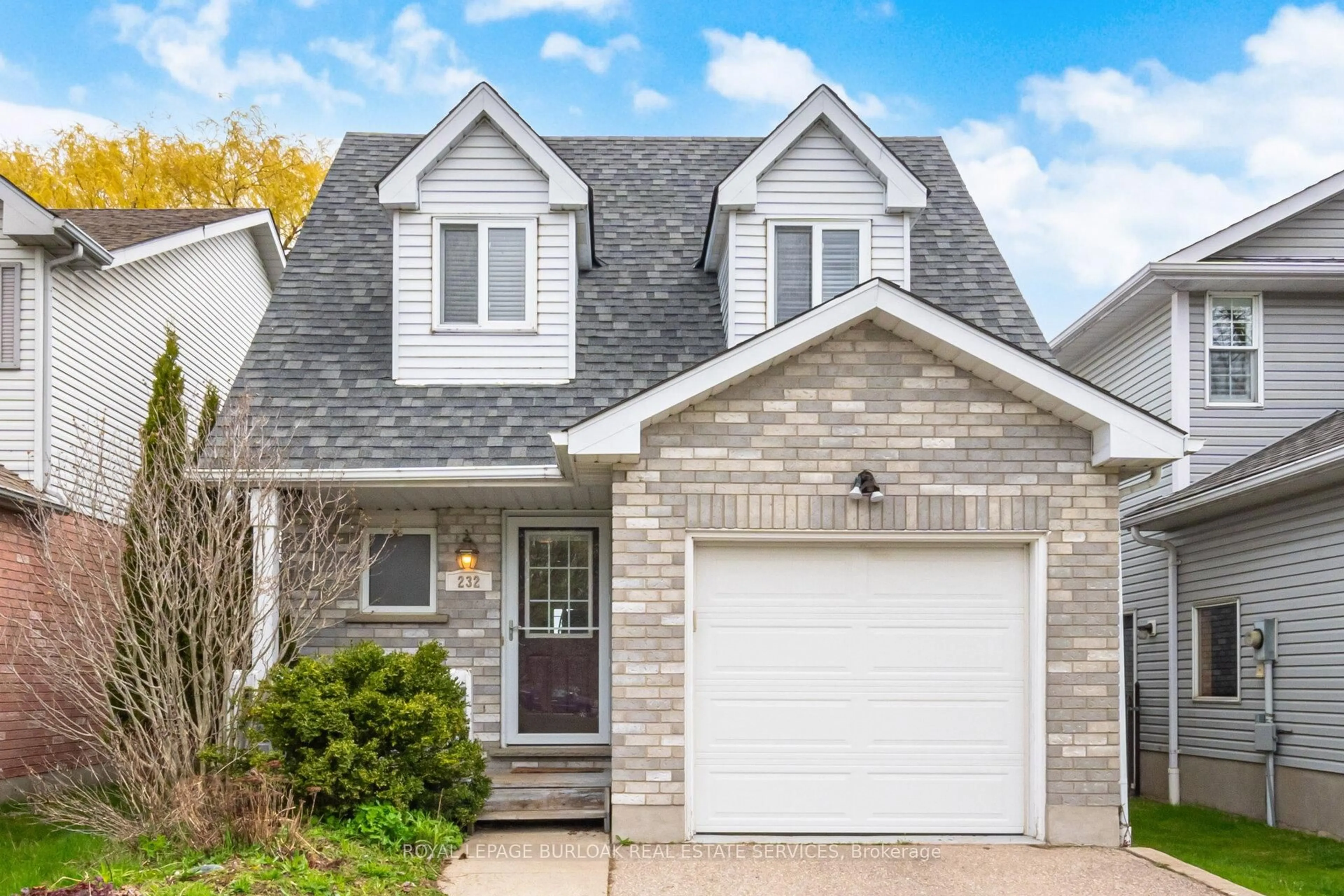 Home with brick exterior material, street for 232 Auburn Dr, Waterloo Ontario N2K 3T3