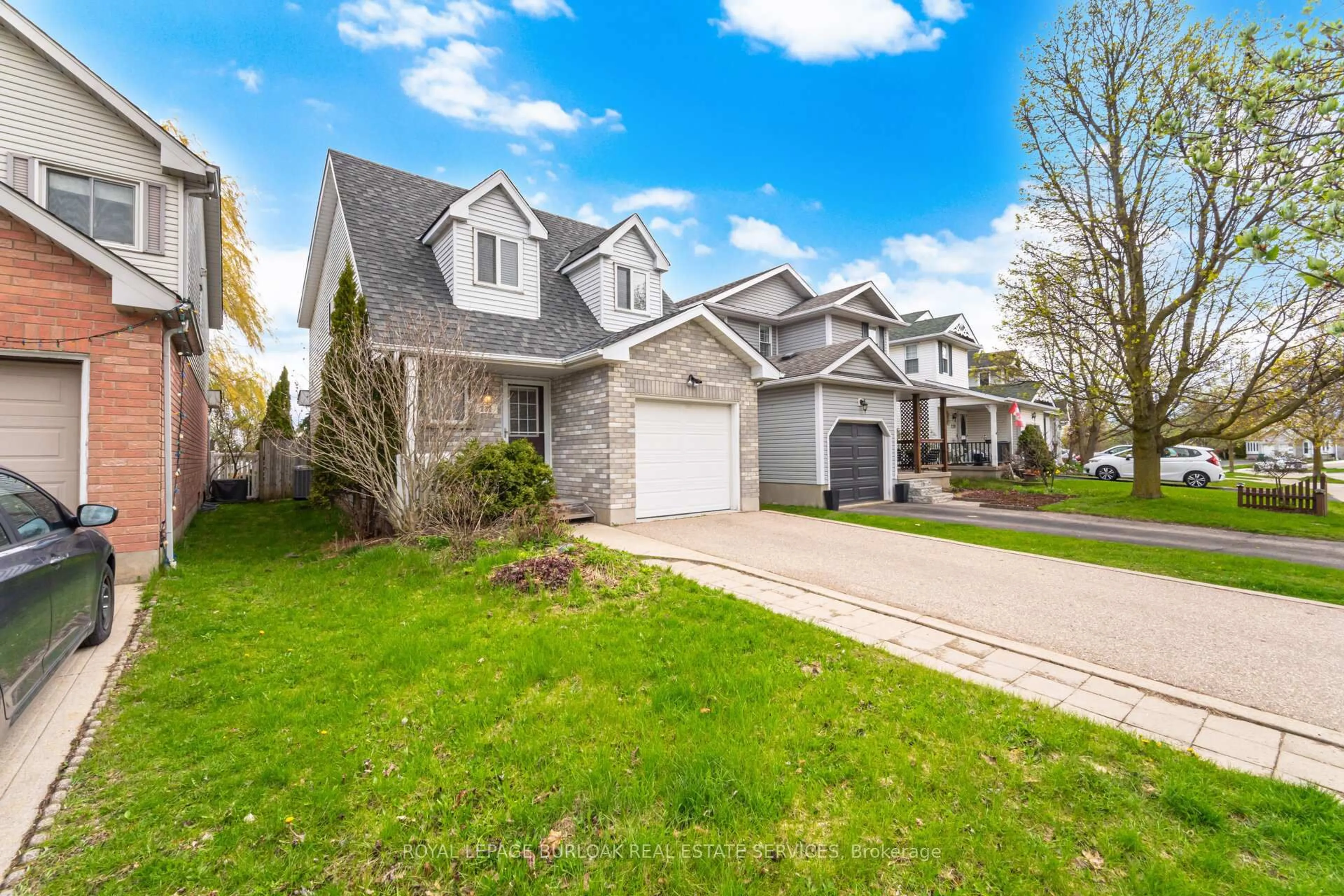 Home with vinyl exterior material, street for 232 Auburn Dr, Waterloo Ontario N2K 3T3