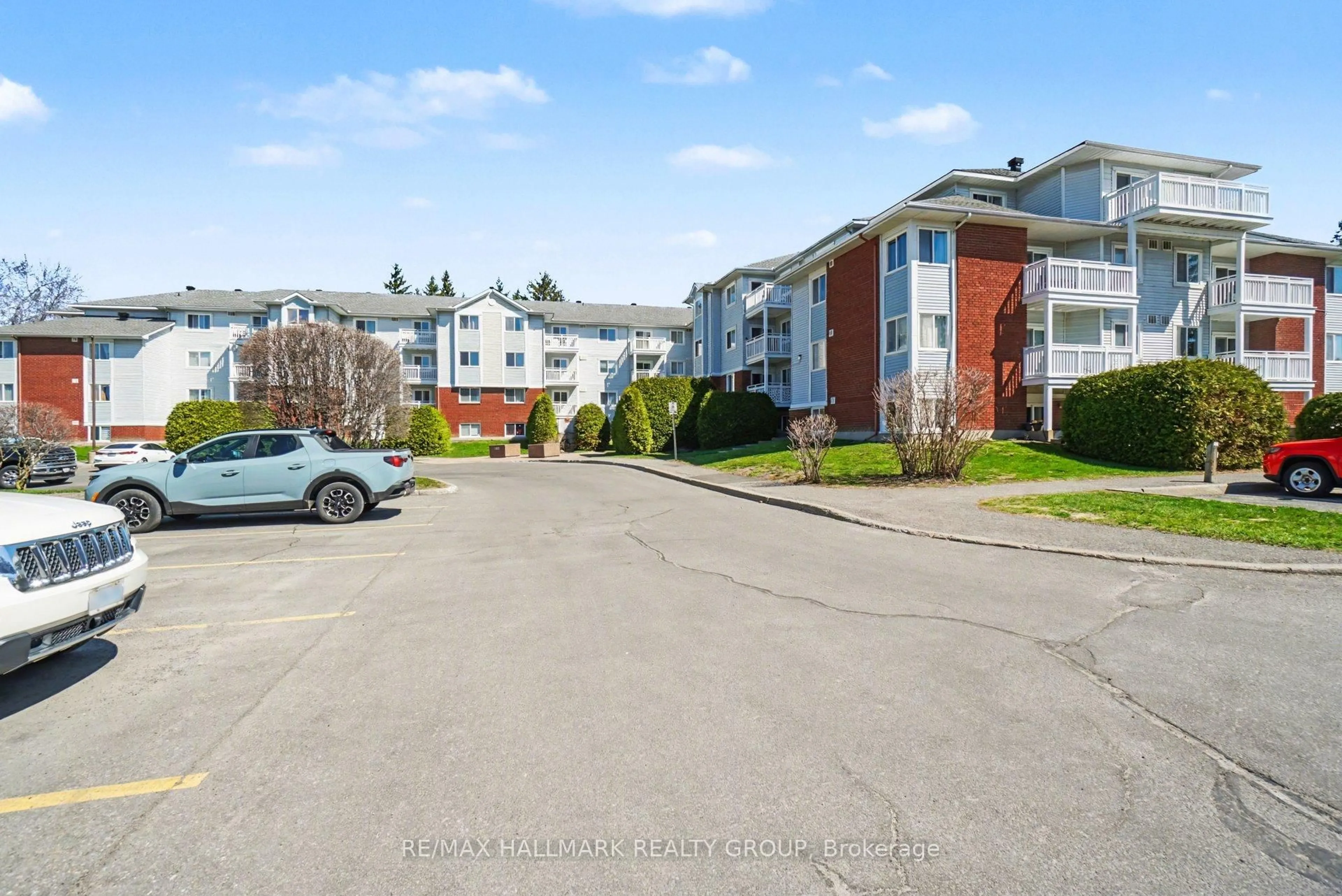 A pic from outside/outdoor area/front of a property/back of a property/a pic from drone, street for 266 Lorry Greenberg Dr #203, Ottawa Ontario K1T 3J9
