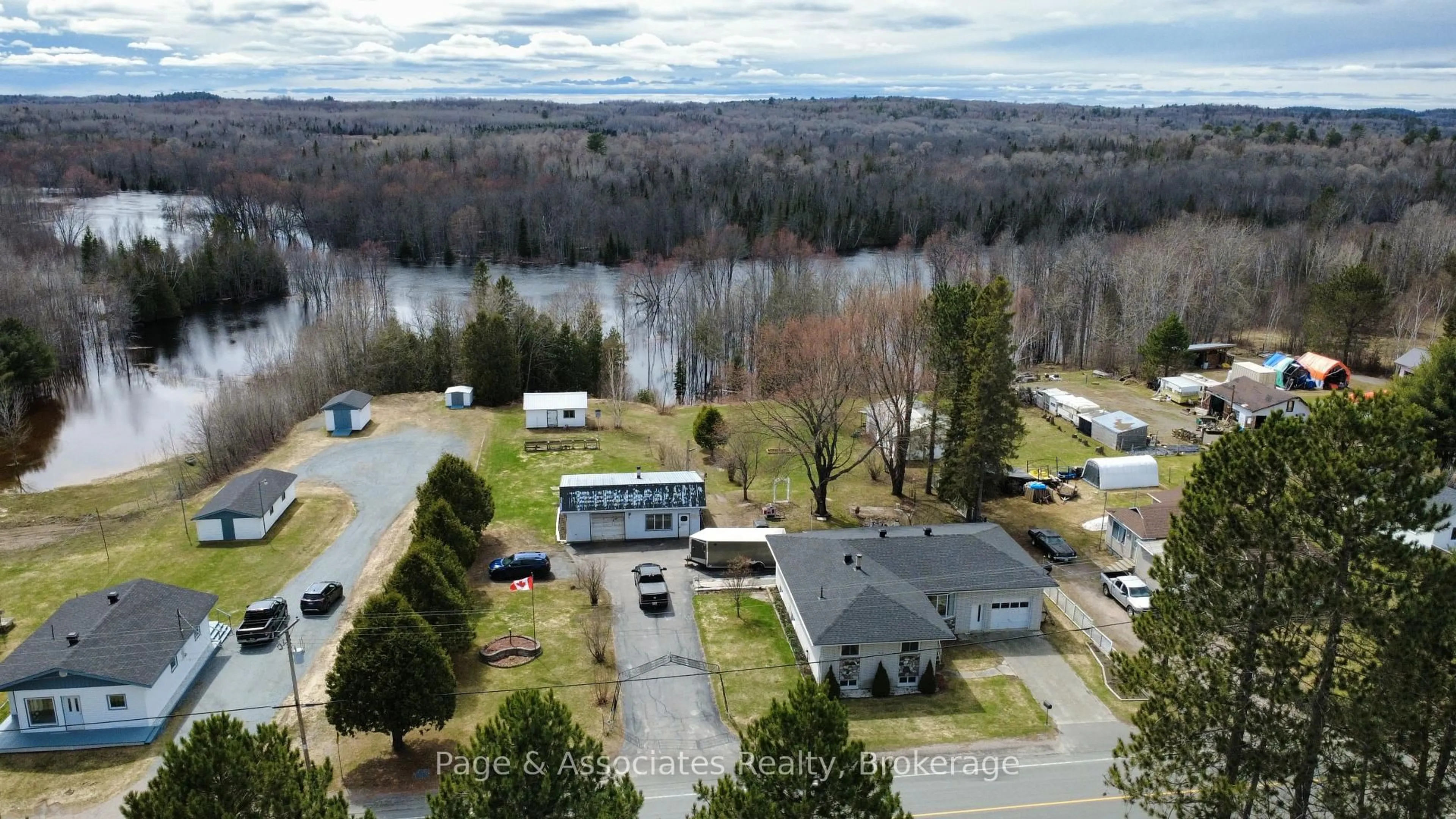 A pic from outside/outdoor area/front of a property/back of a property/a pic from drone, water/lake/river/ocean view for 101 Highway 539A, West Nipissing Ontario P0H 2C0