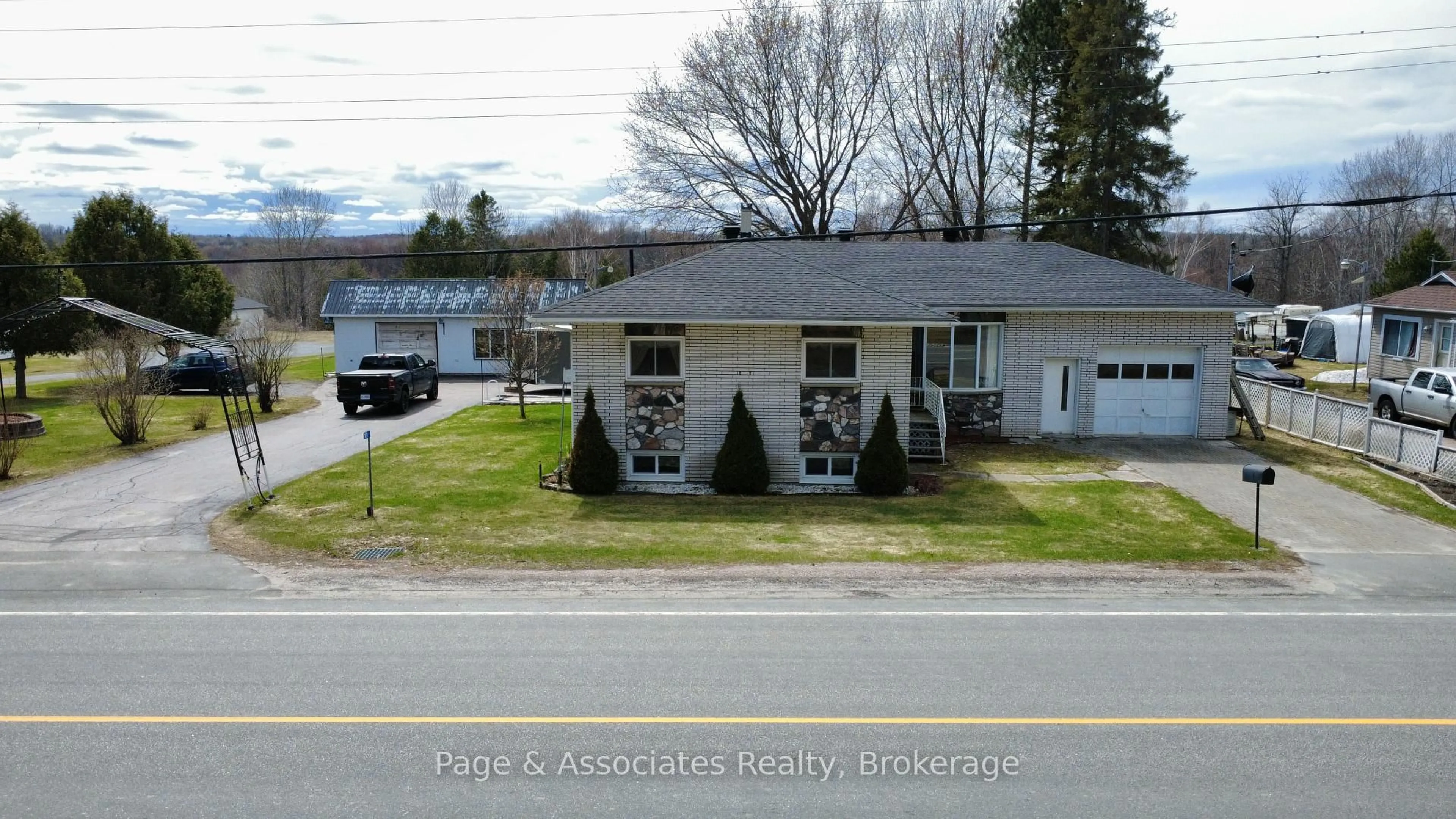 A pic from outside/outdoor area/front of a property/back of a property/a pic from drone, building for 101 Highway 539A, West Nipissing Ontario P0H 2C0