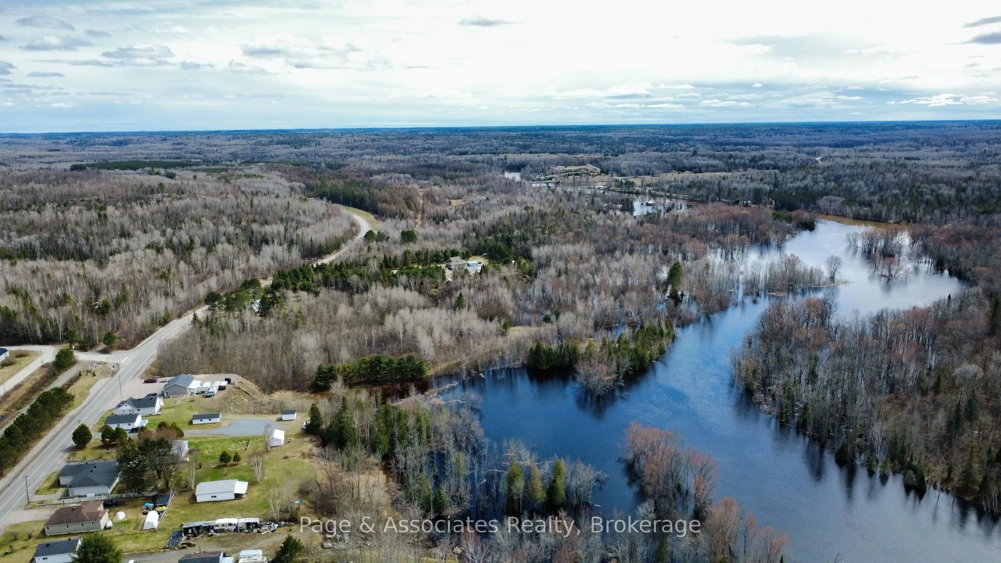 A pic from outside/outdoor area/front of a property/back of a property/a pic from drone, water/lake/river/ocean view for 101 Highway 539A, West Nipissing Ontario P0H 2C0