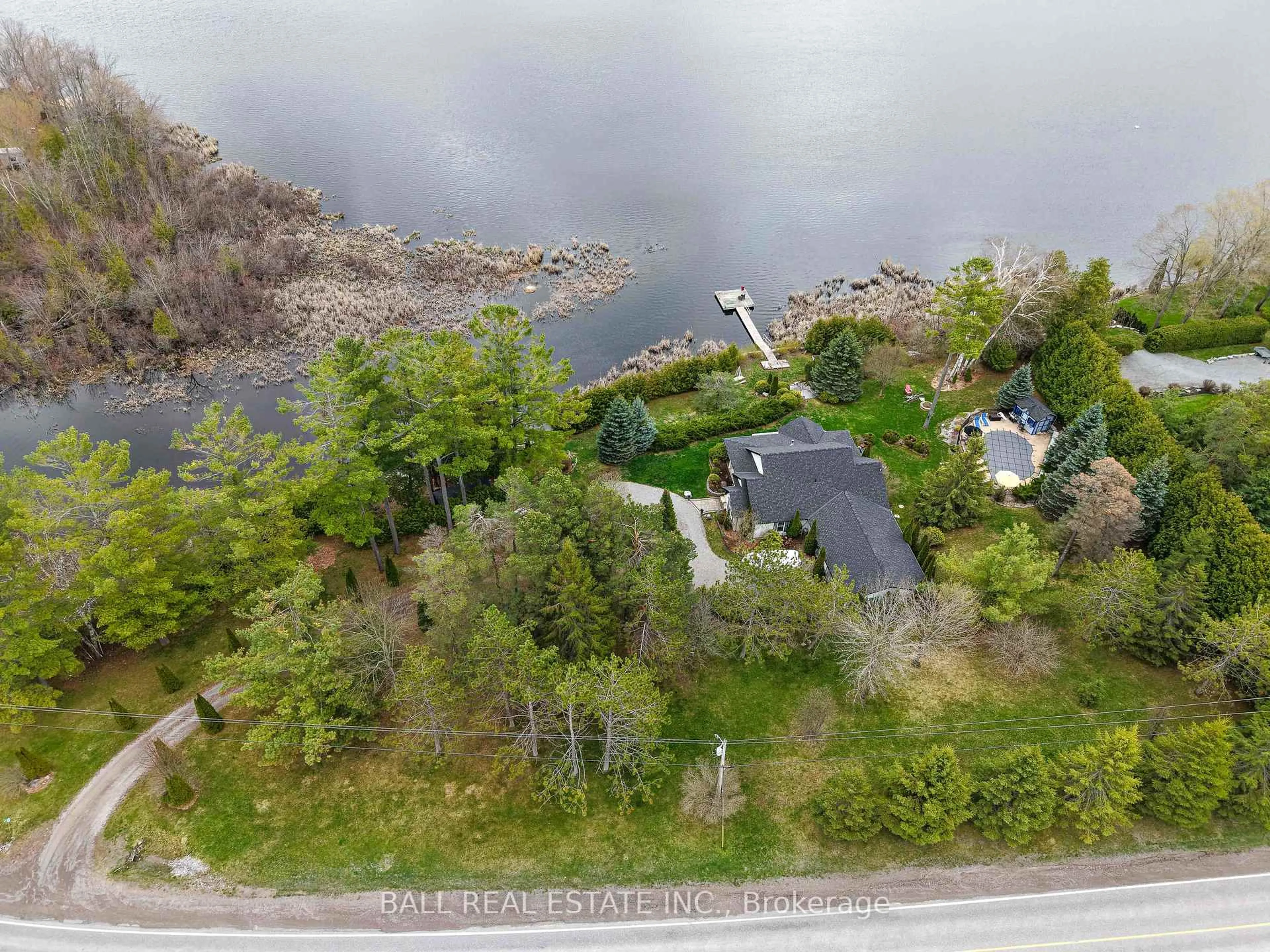 A pic from outside/outdoor area/front of a property/back of a property/a pic from drone, water/lake/river/ocean view for 1725 Young's Point Rd, Selwyn Ontario K0L 2H0