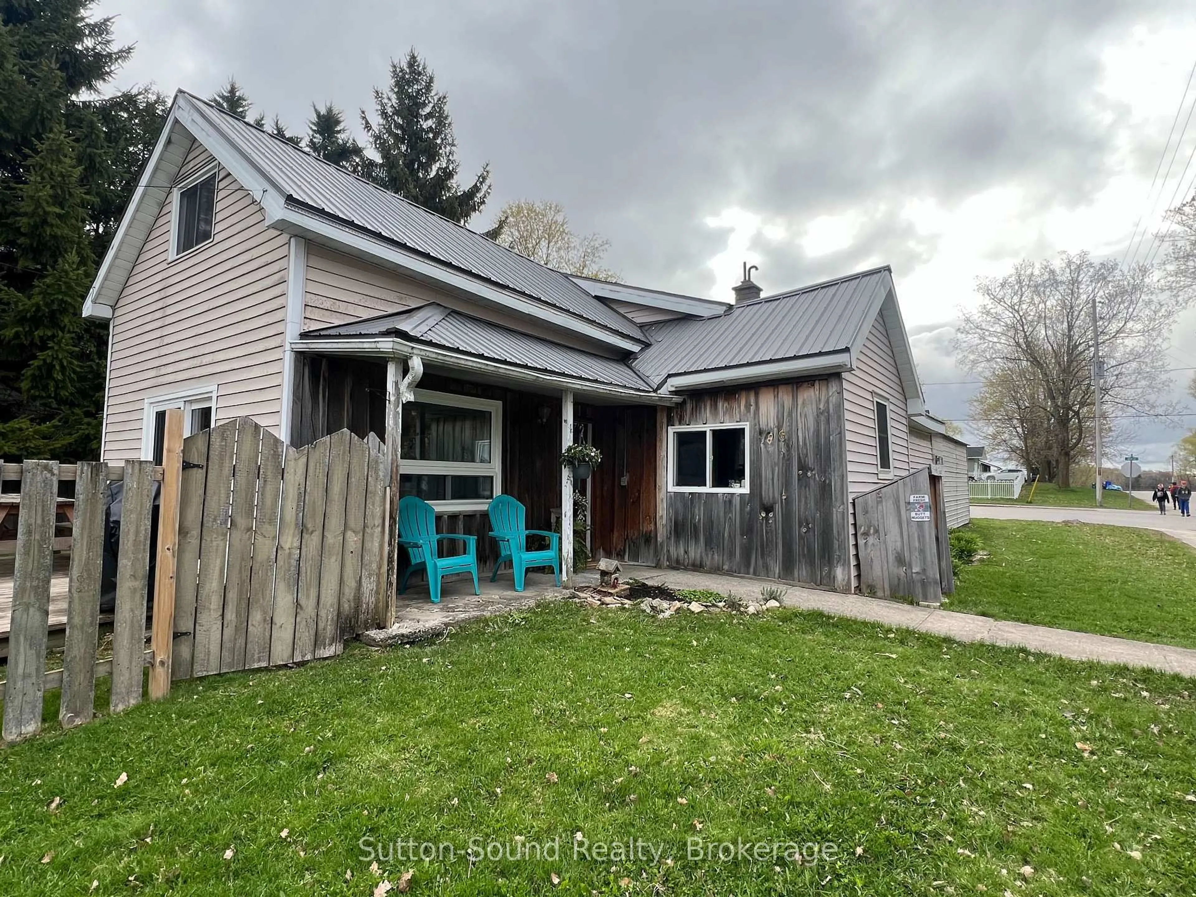 A pic from outside/outdoor area/front of a property/back of a property/a pic from drone, street for 34 Main St, Arran-Elderslie Ontario N0H 2N0