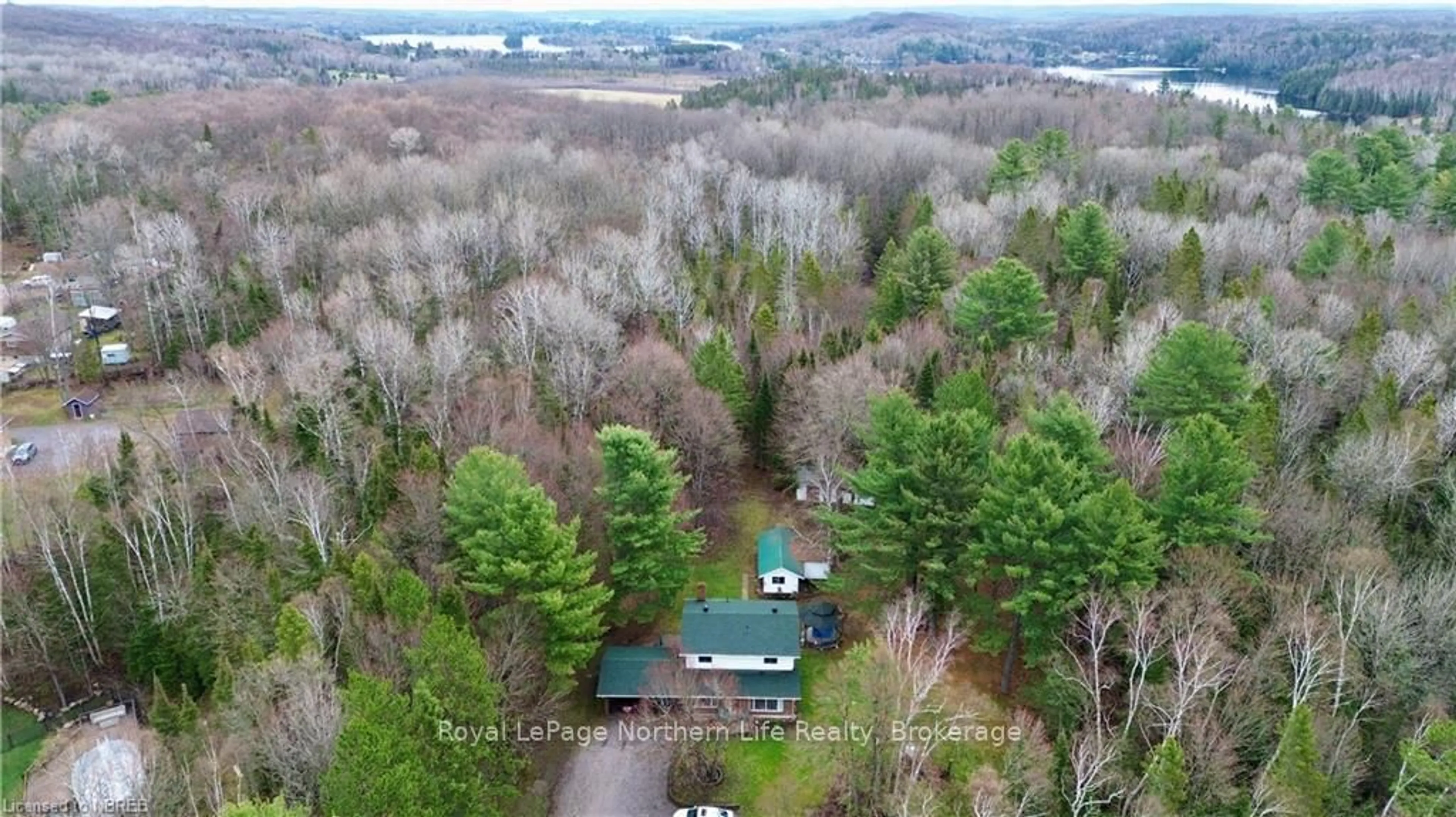 A pic from outside/outdoor area/front of a property/back of a property/a pic from drone, forest/trees view for 64 Astorville Rd, East Ferris Ontario P0H 1B0