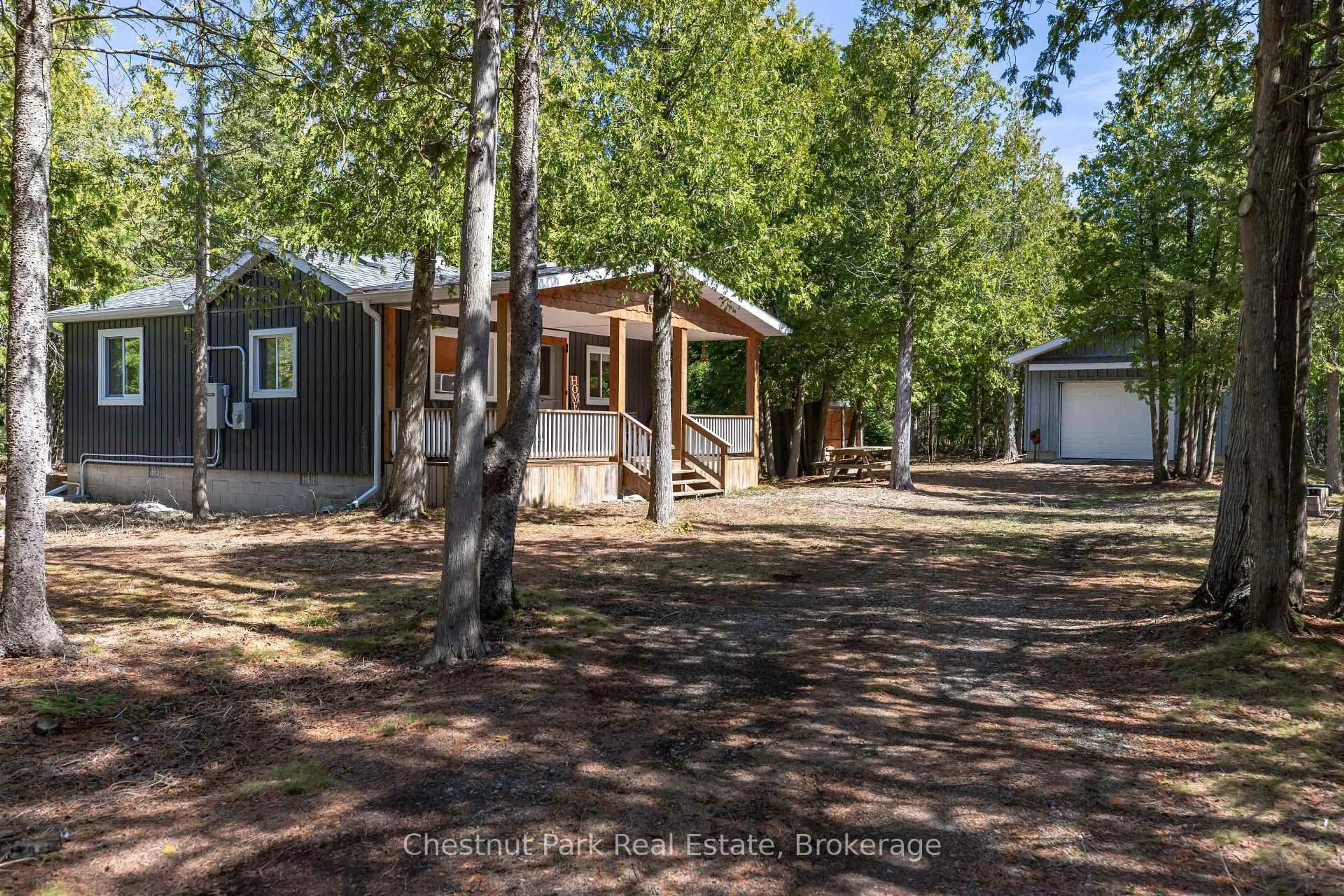 A pic from outside/outdoor area/front of a property/back of a property/a pic from drone, forest/trees view for 6760 Highway 6, Northern Bruce Peninsula Ontario N0H 2R0