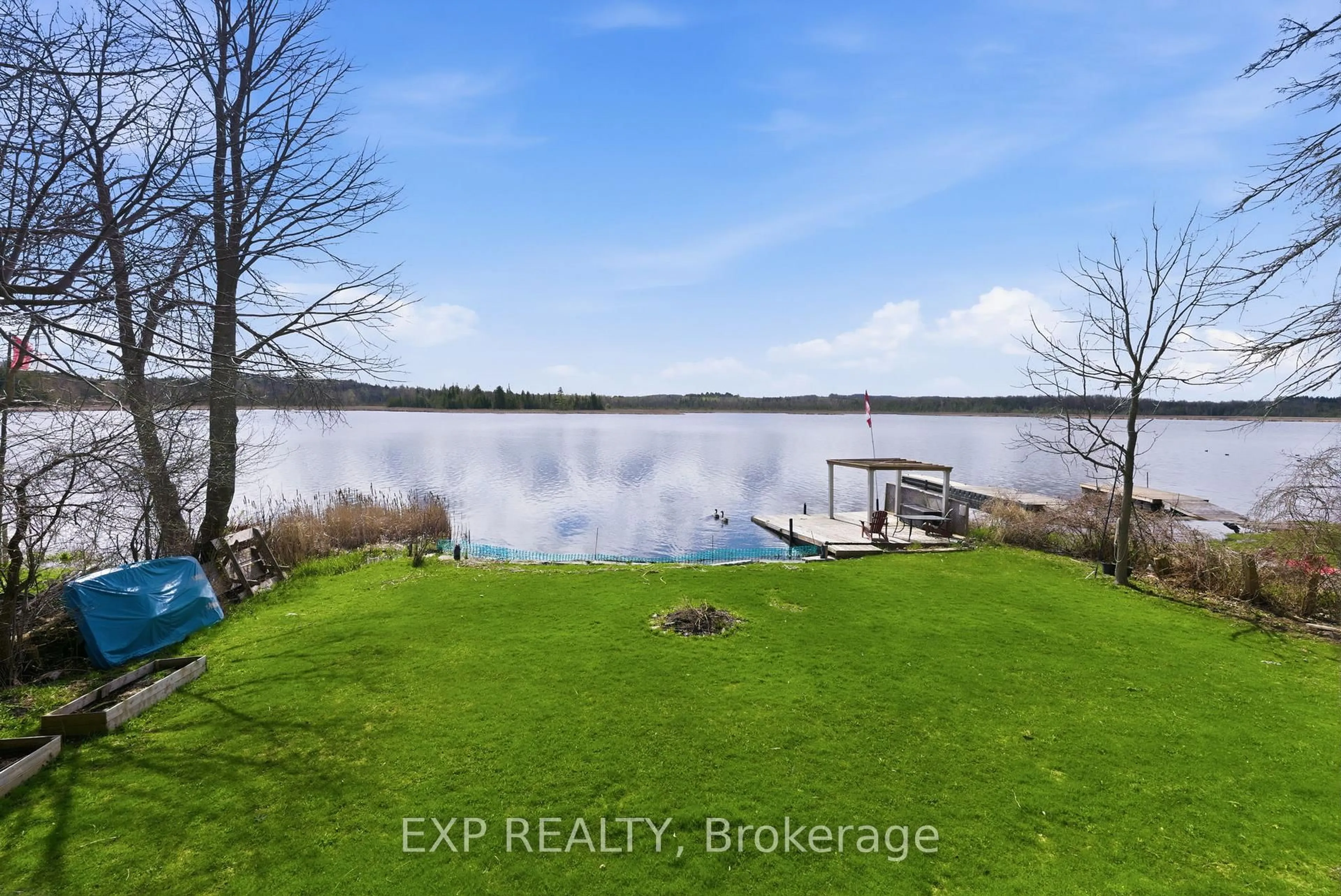 A pic from outside/outdoor area/front of a property/back of a property/a pic from drone, water/lake/river/ocean view for 38 Cowans Cres, Kawartha Lakes Ontario K0L 2W0