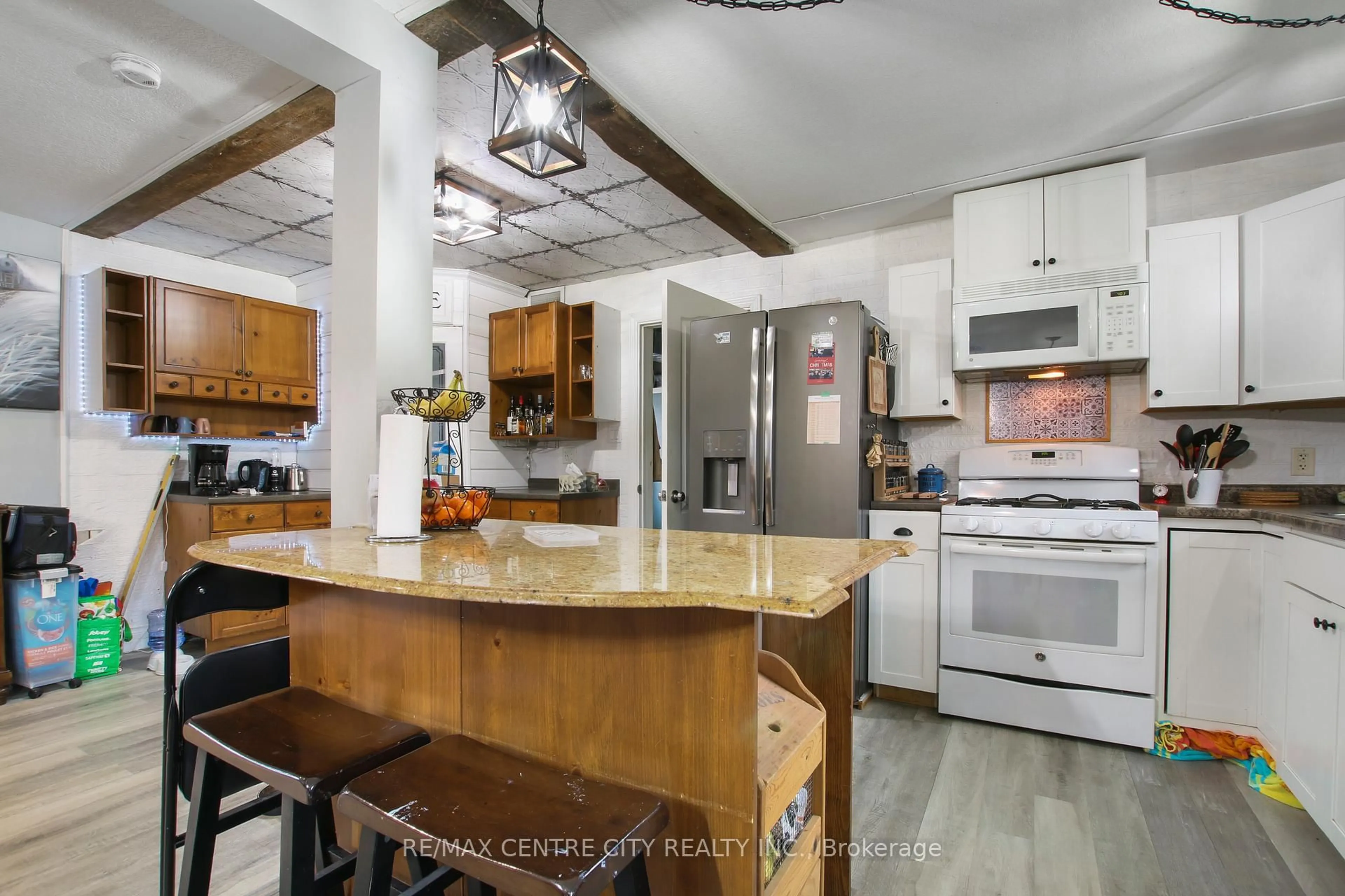 Open concept kitchen, ceramic/tile floor for 129 Duchess Ave, Lucan Biddulph Ontario N0M 2J0
