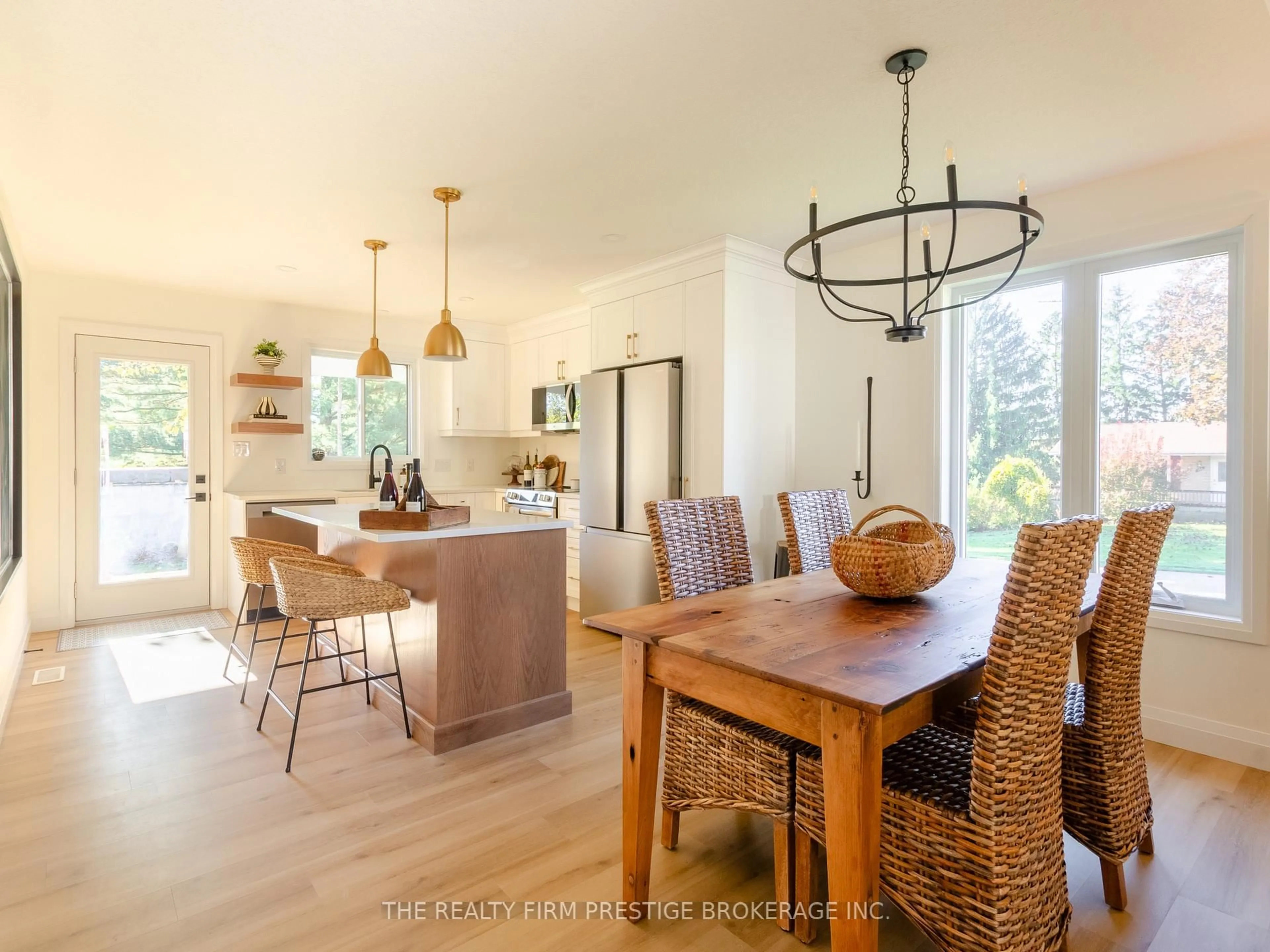 Open concept kitchen, wood/laminate floor for 32 Broadway Ave, Chatham-Kent Ontario N0P 2C0