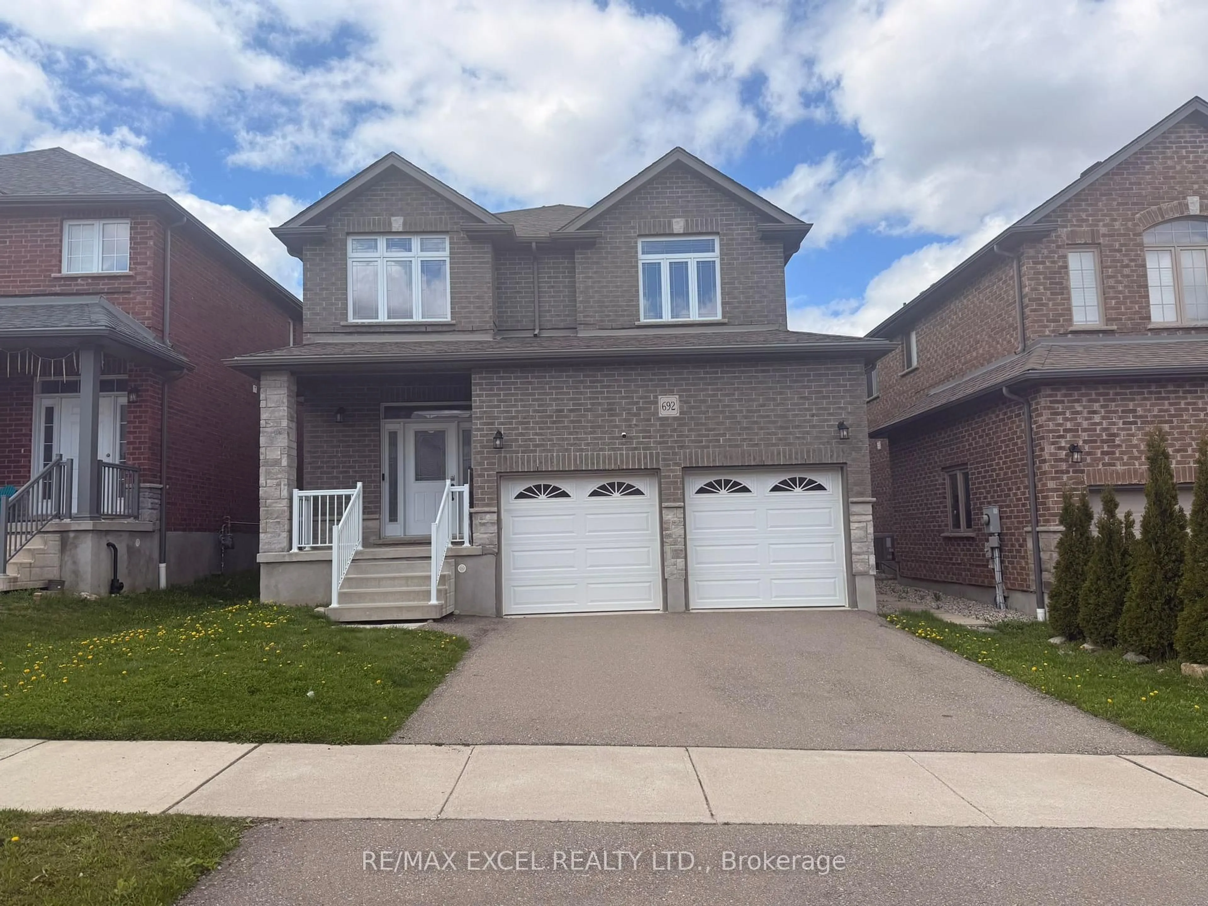 Home with brick exterior material, street for 692 Indian Grass St, Waterloo Ontario N2V 0C9