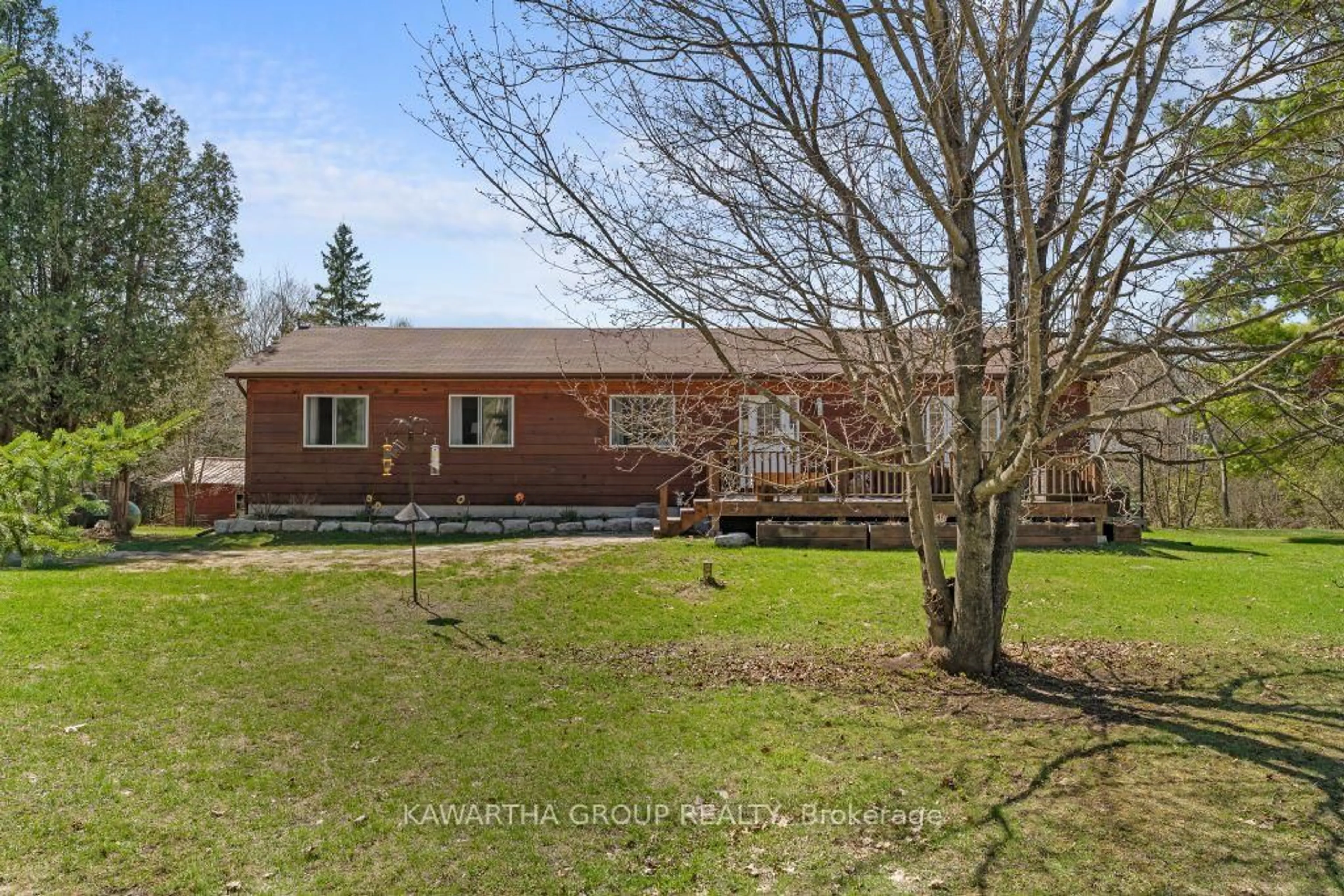 A pic from outside/outdoor area/front of a property/back of a property/a pic from drone, unknown for 1057 Base Line Rd, Kawartha Lakes Ontario K0M 1K0