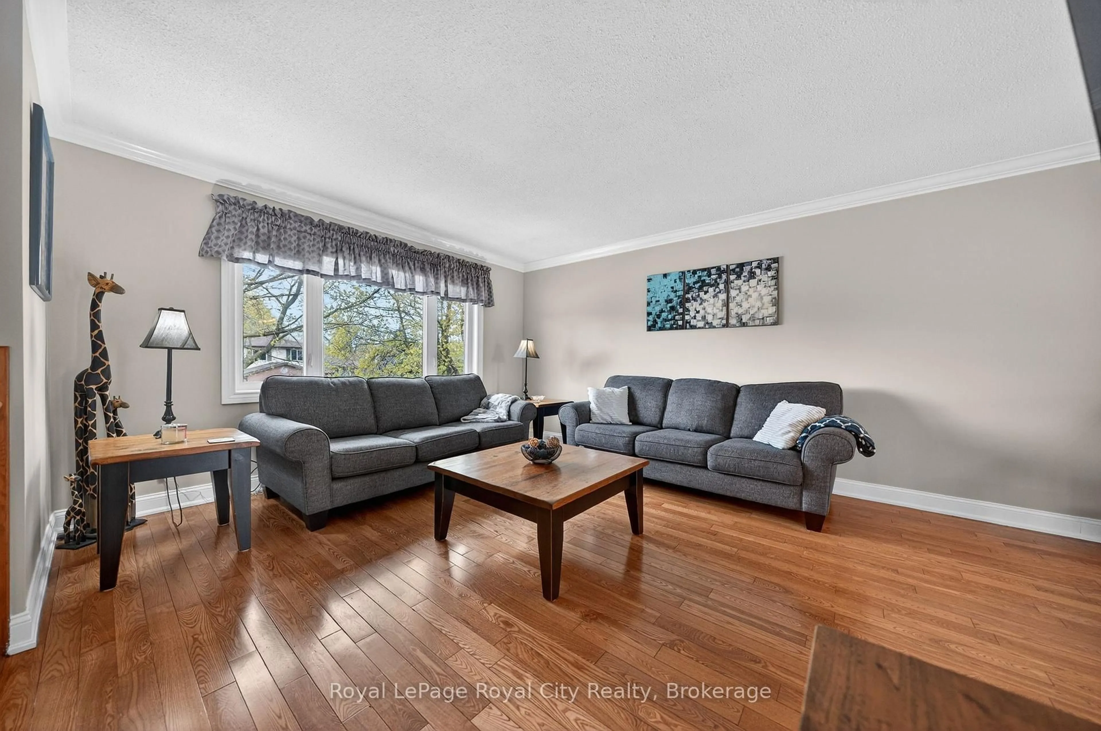 Living room with furniture, unknown for 69 Sanderson Dr, Guelph Ontario N1H 7K1