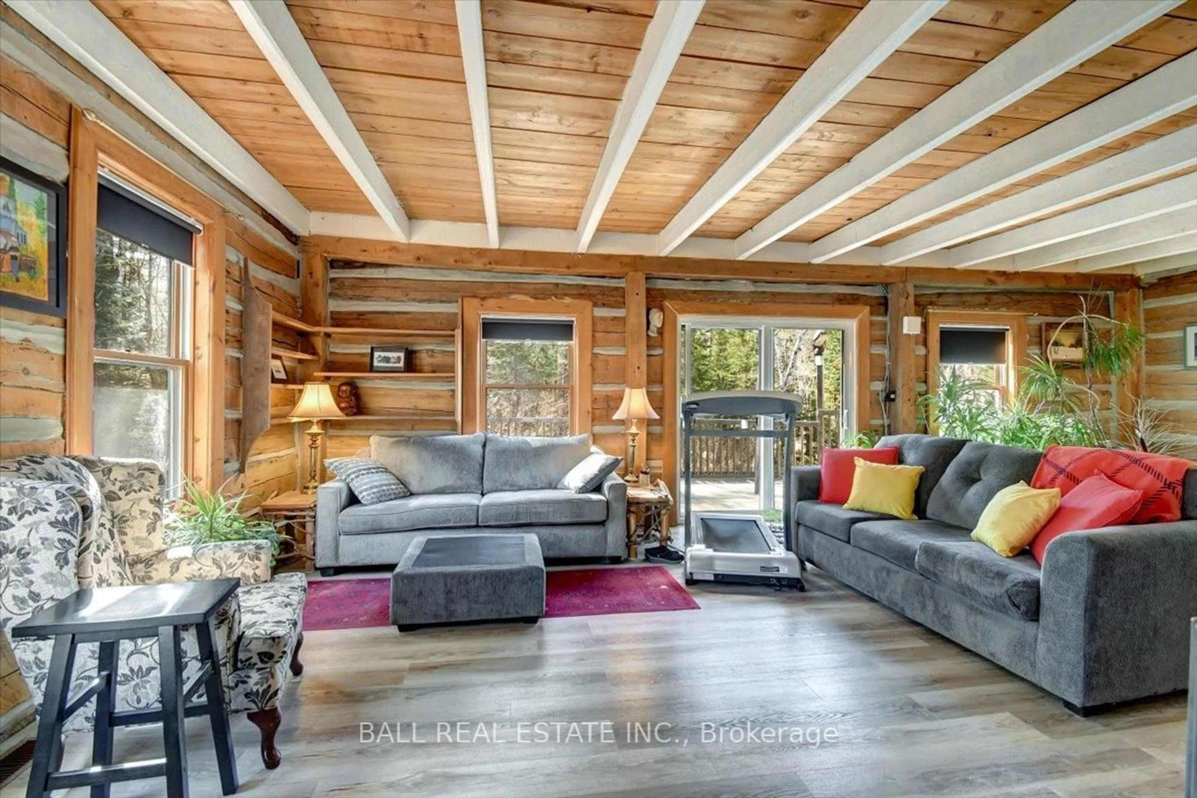 Living room with furniture, wood/laminate floor for 735 Smaglinski-Stoppa Pkwy, Wilno Ontario K0J 2N0