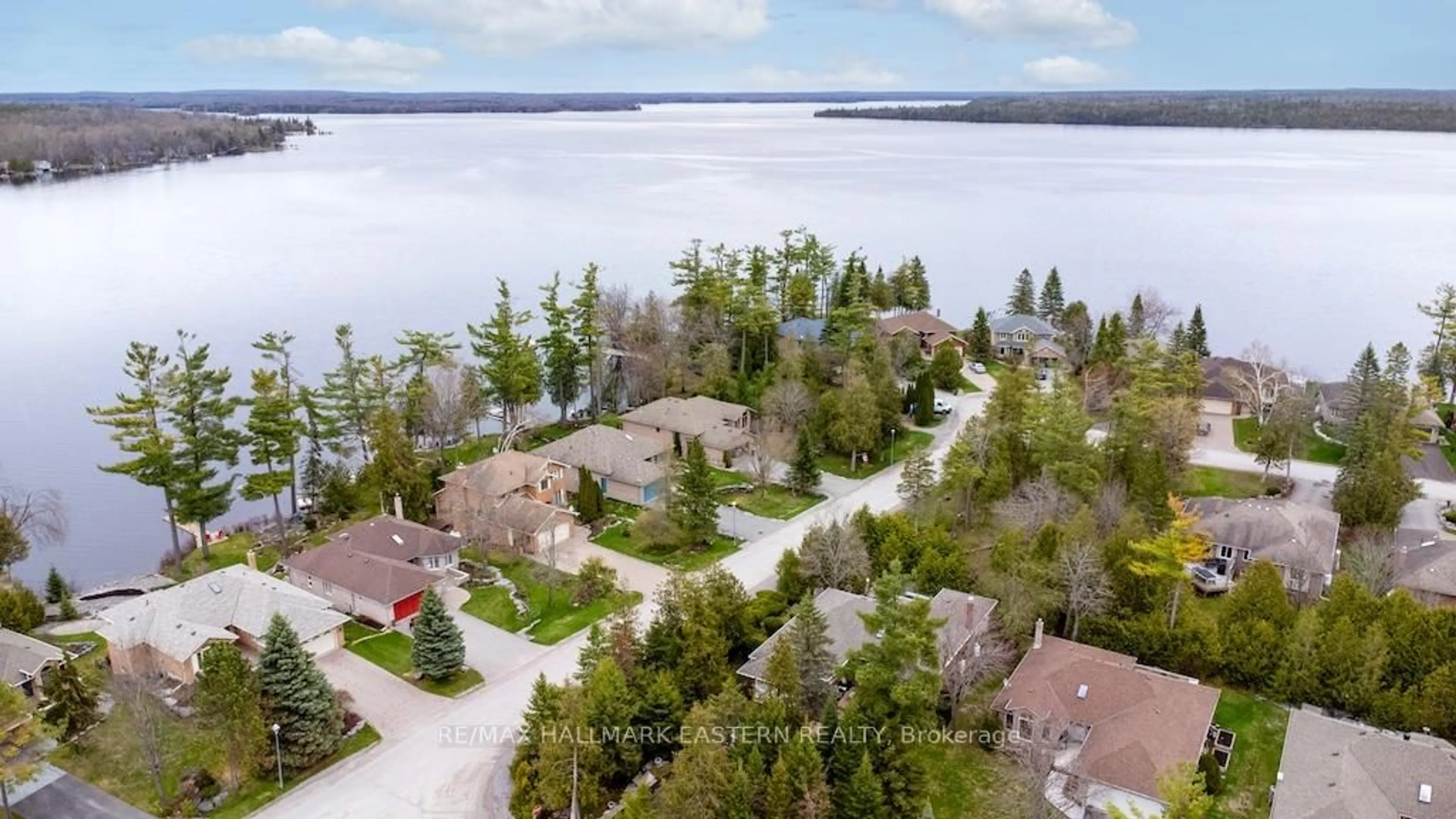 A pic from outside/outdoor area/front of a property/back of a property/a pic from drone, water/lake/river/ocean view for 38 Patricia Pl, Kawartha Lakes Ontario K0M 1A0