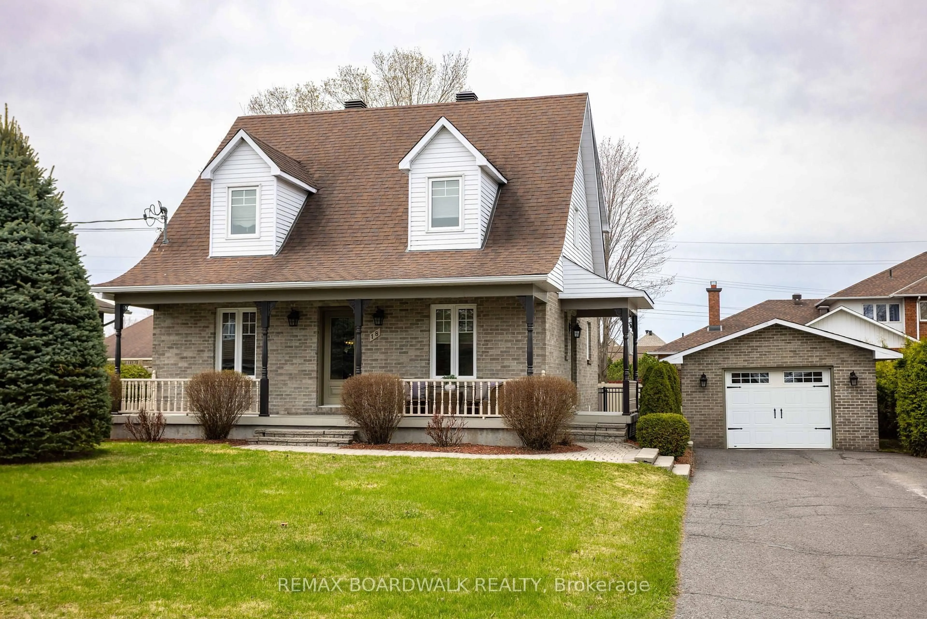 Home with brick exterior material, street for 18 Alice St, Casselman Ontario K0A 1M0