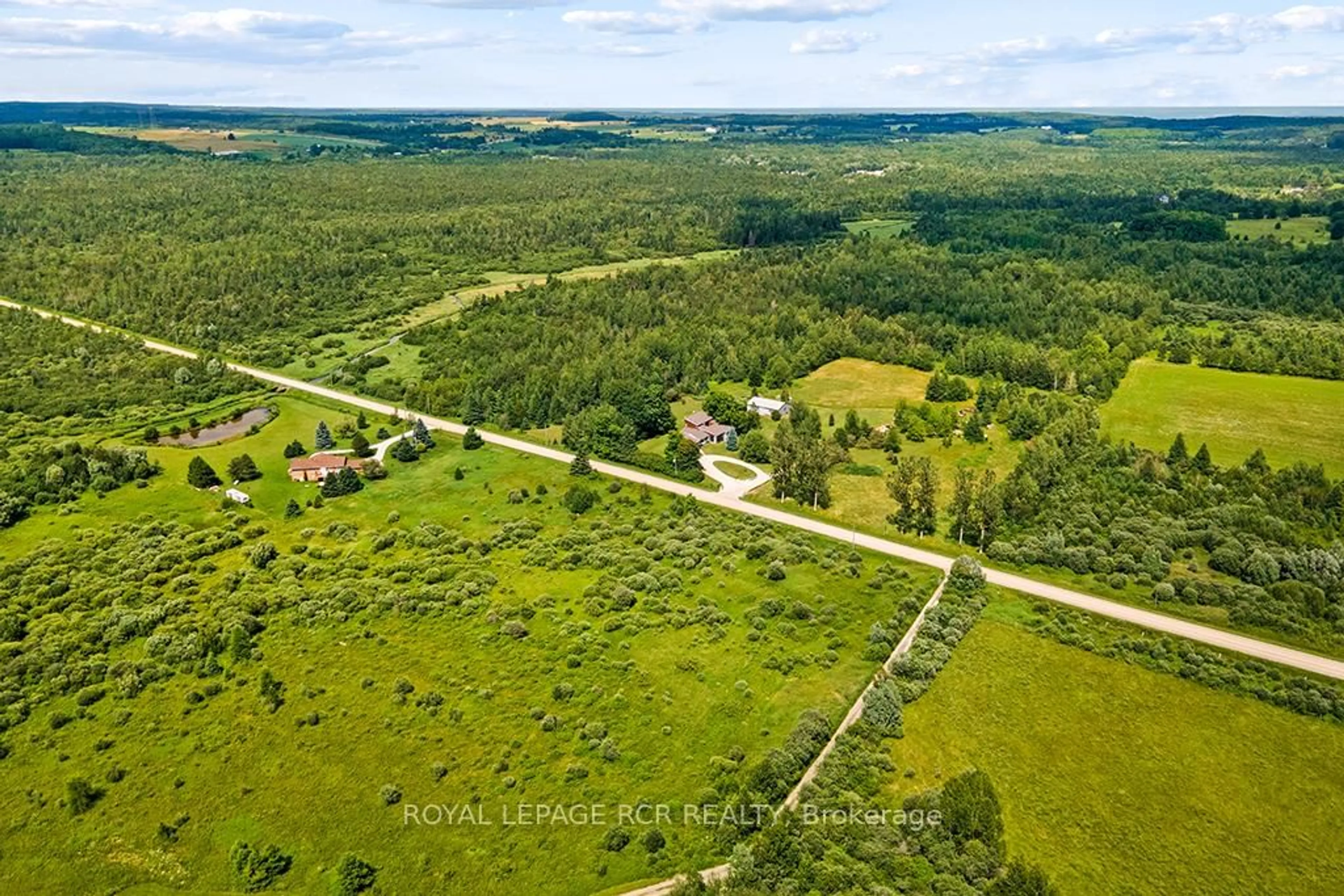 A pic from outside/outdoor area/front of a property/back of a property/a pic from drone, forest/trees view for 595133 Blind Line, Mono Ontario L9W 5N4